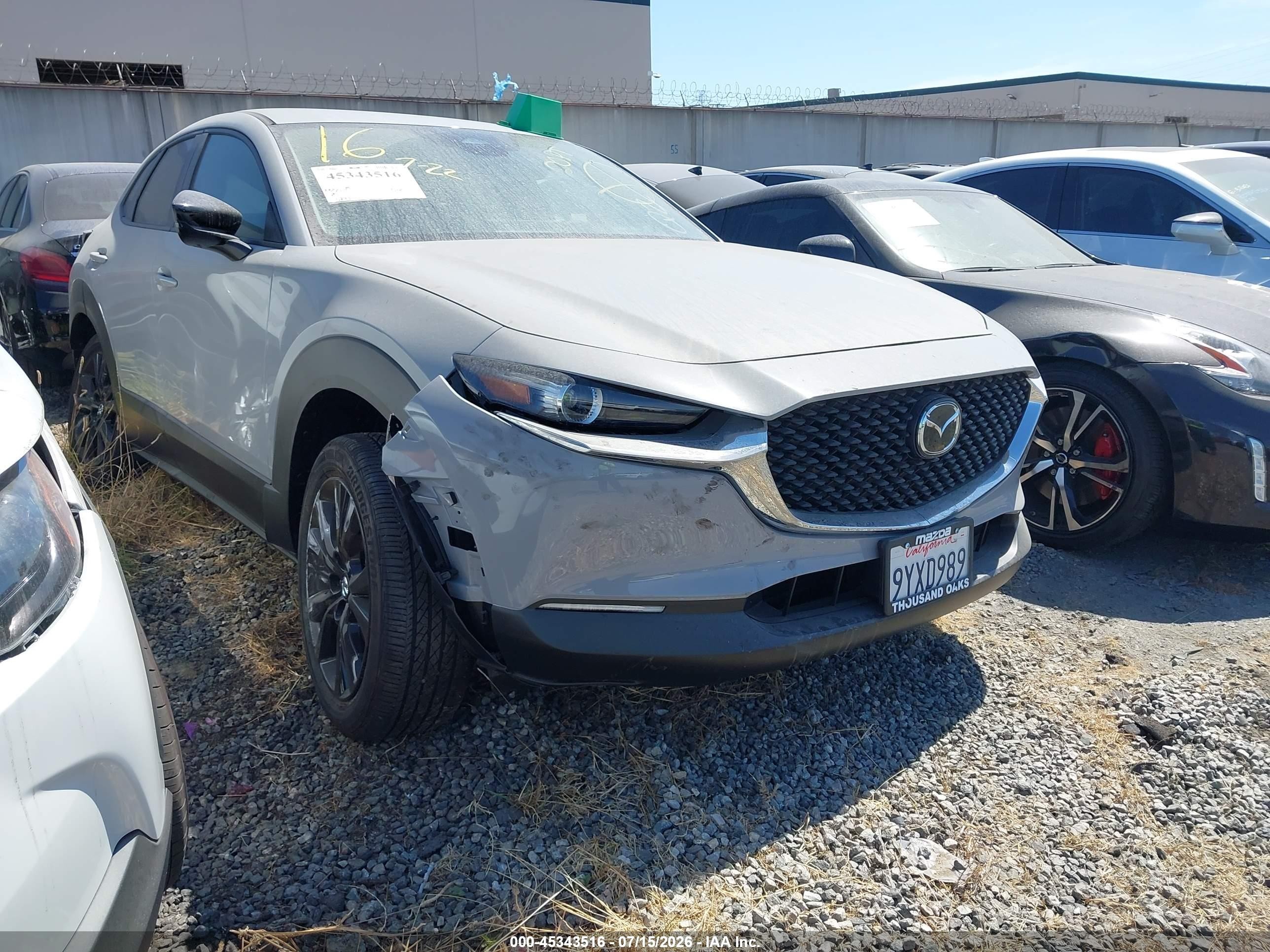 2026 Mazda CX-30 S Select Sport, VIN 3MVDMBBL9TM144221 — Rear end