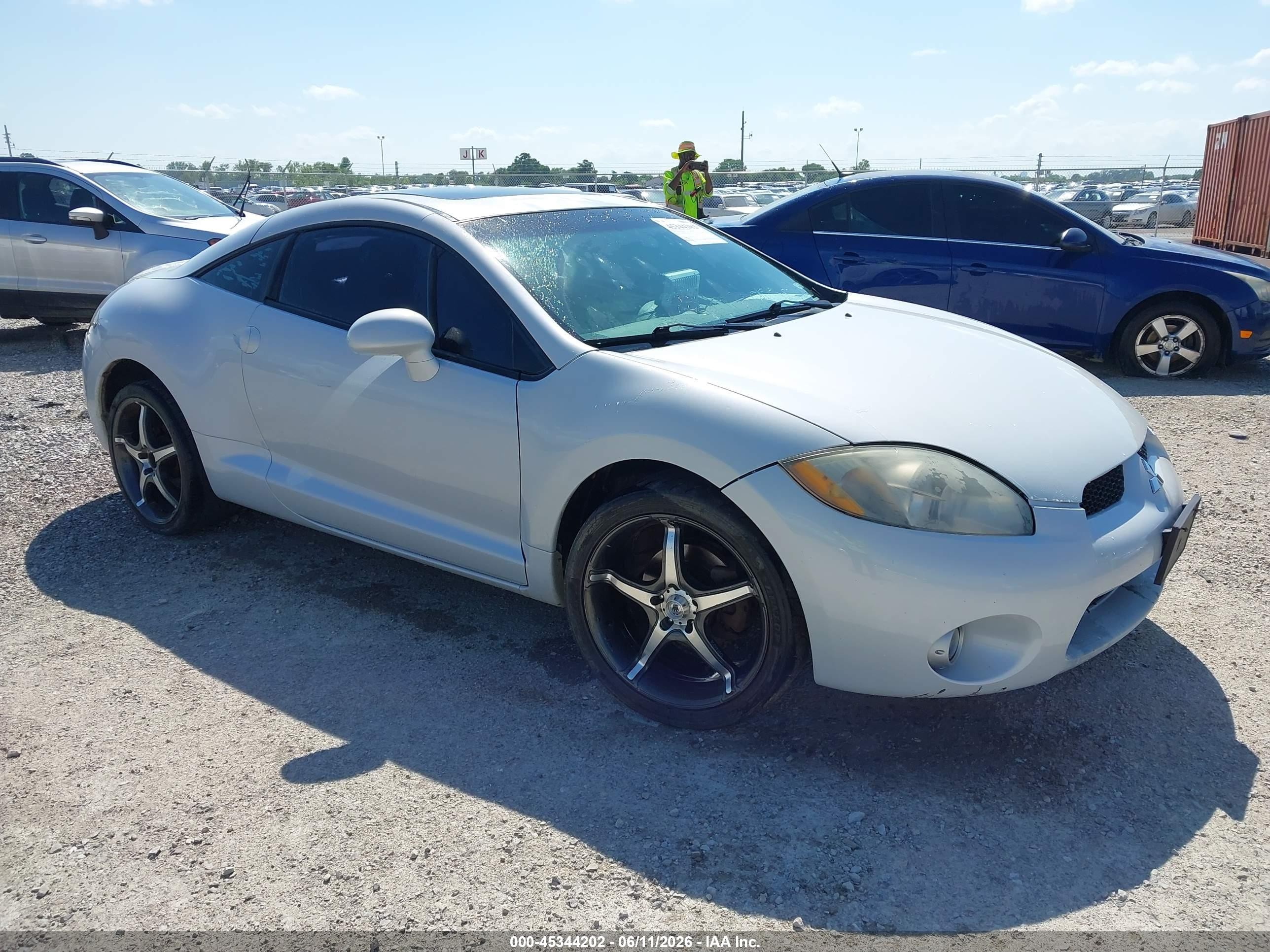 2007 Mitsubishi Eclipse GT, VIN 4A3AK34TX7E008816 — Зад