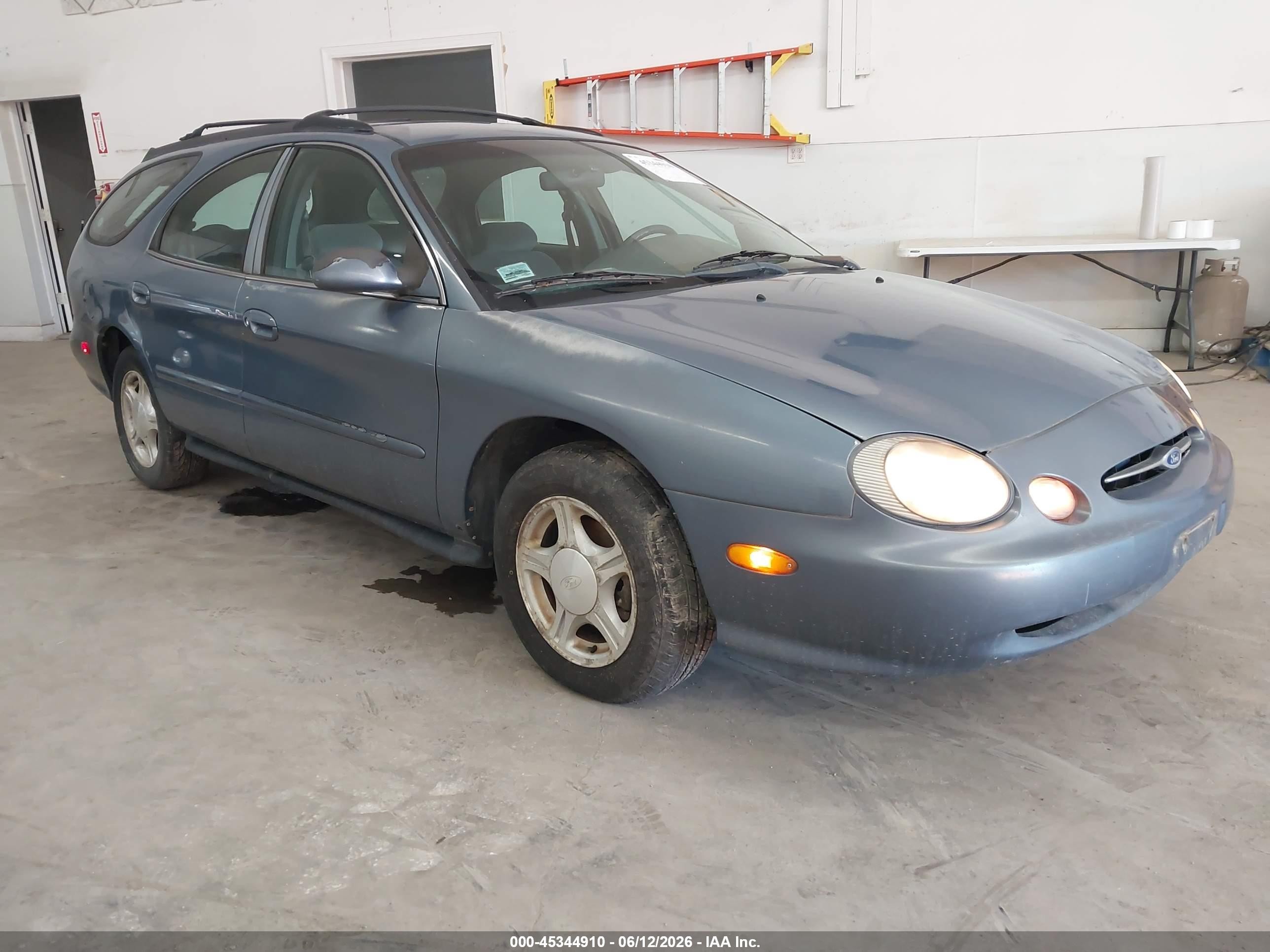1999 Ford Taurus SE, VIN 1FAFP58U3XG220752 — Normal wear