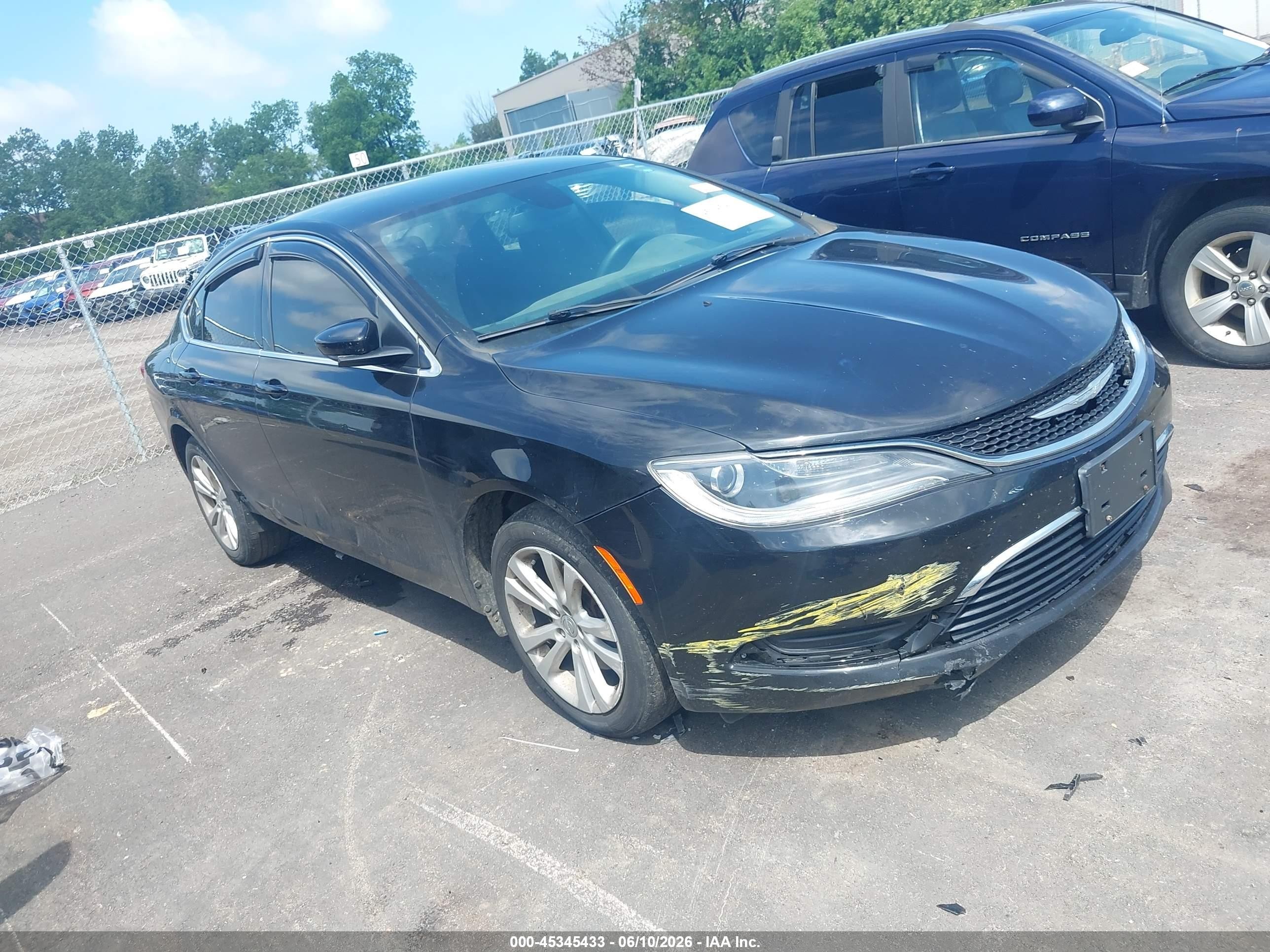 2015 Chrysler 200 Limited, VIN 1C3CCCAB6FN715029 — Side