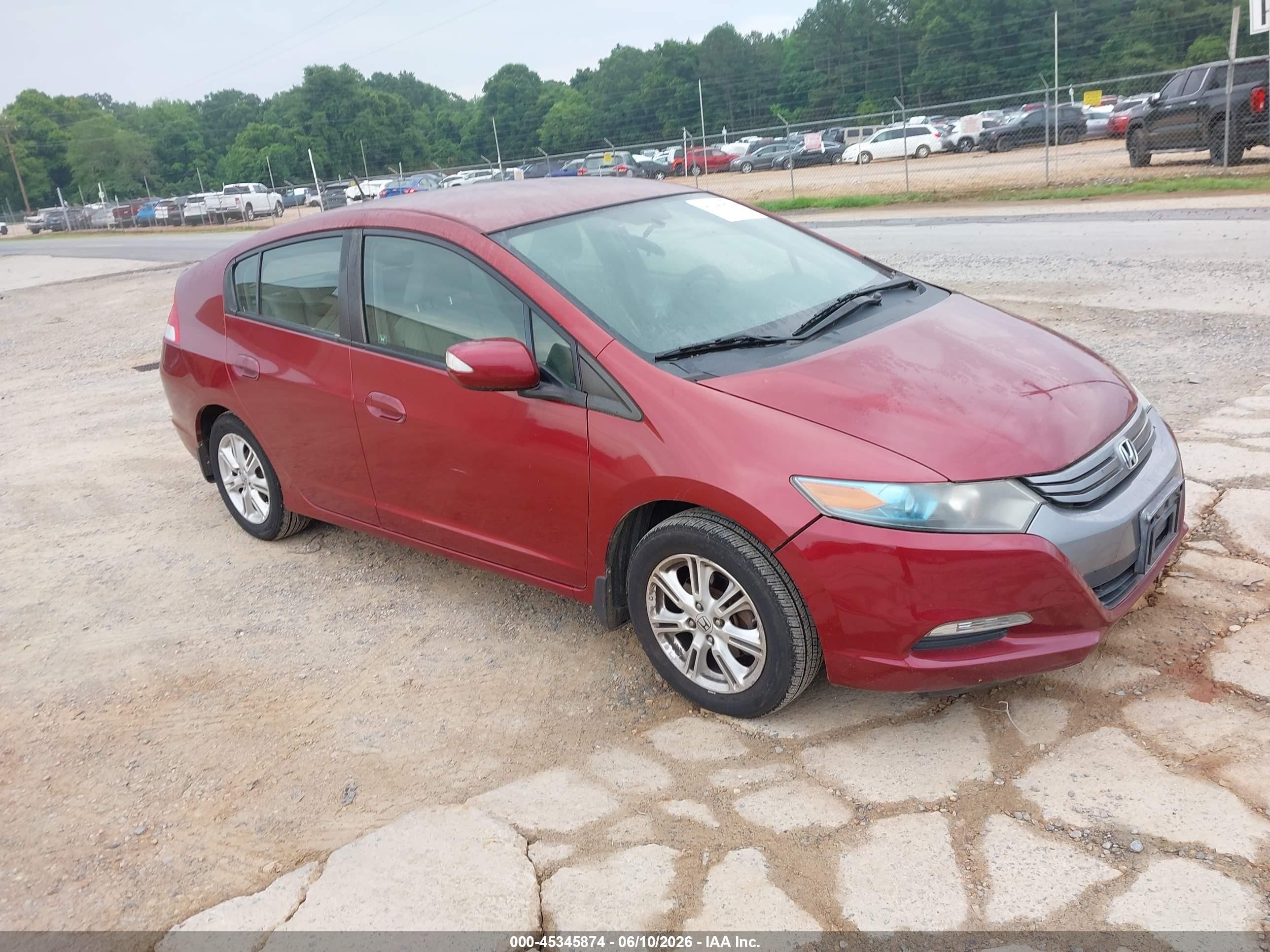 2010 Honda Insight EX, VIN JHMZE2H72AS019935 — Side