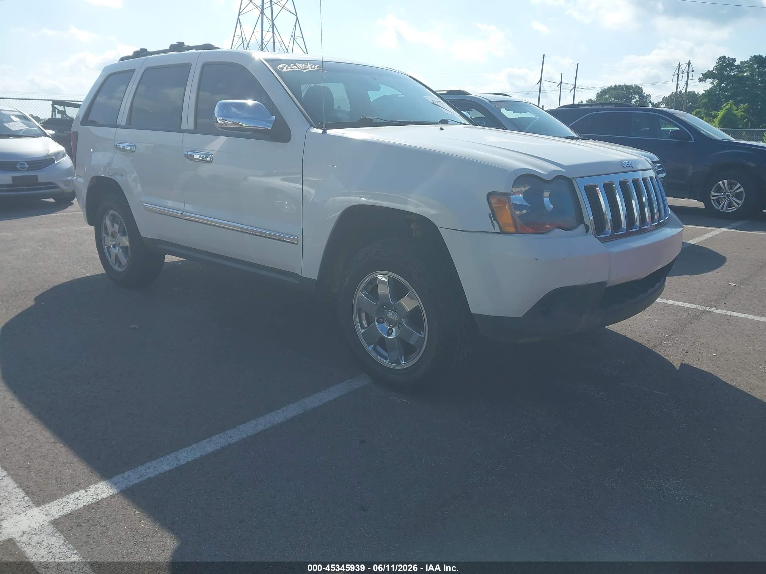 2010 Jeep Grand Cherokee Laredo, VIN 1J4PS4GKXAC156418 — Rear end