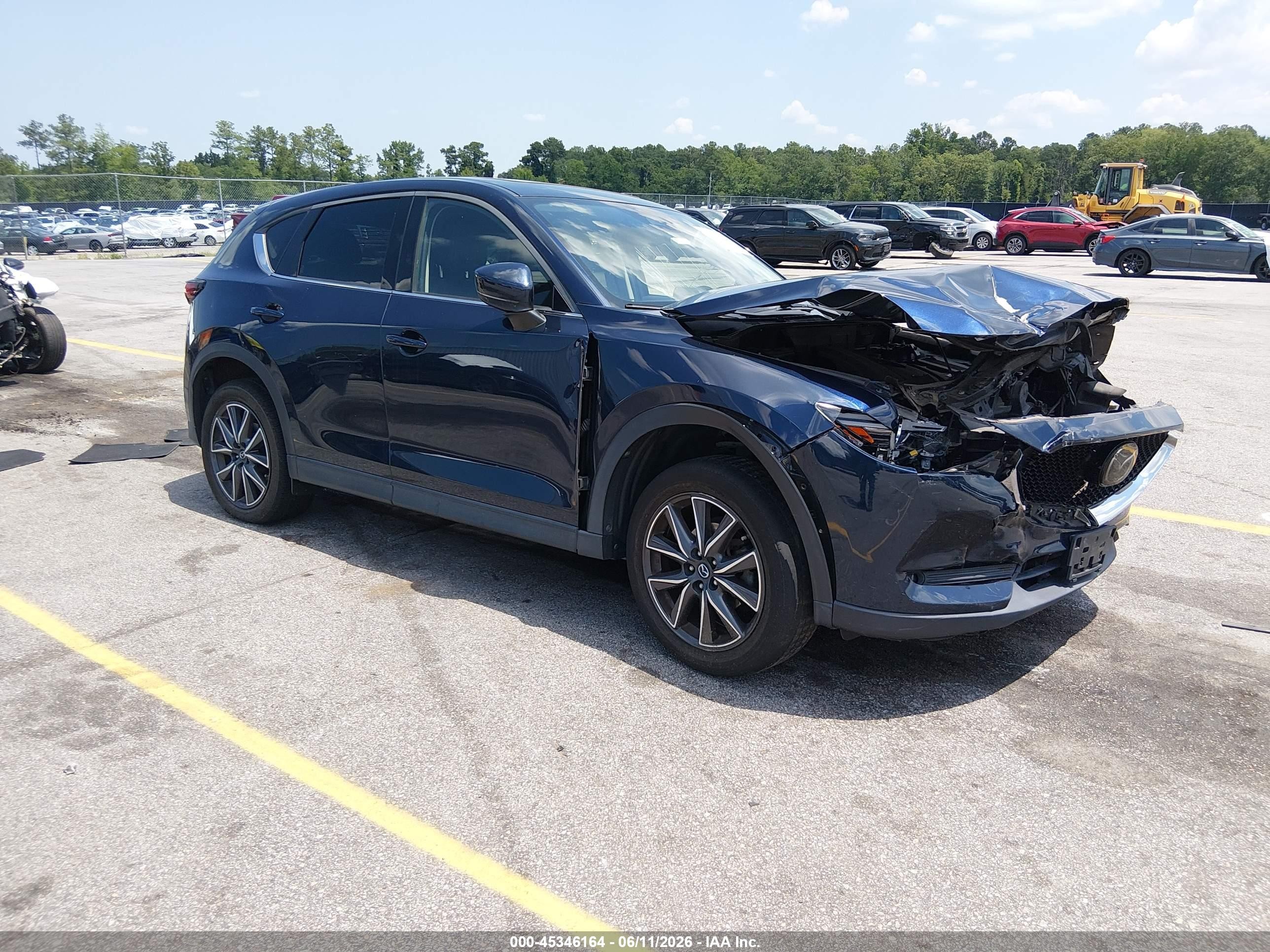 2018 Mazda CX-5 Grand Touring, VIN JM3KFBDM4J0437119 — Side