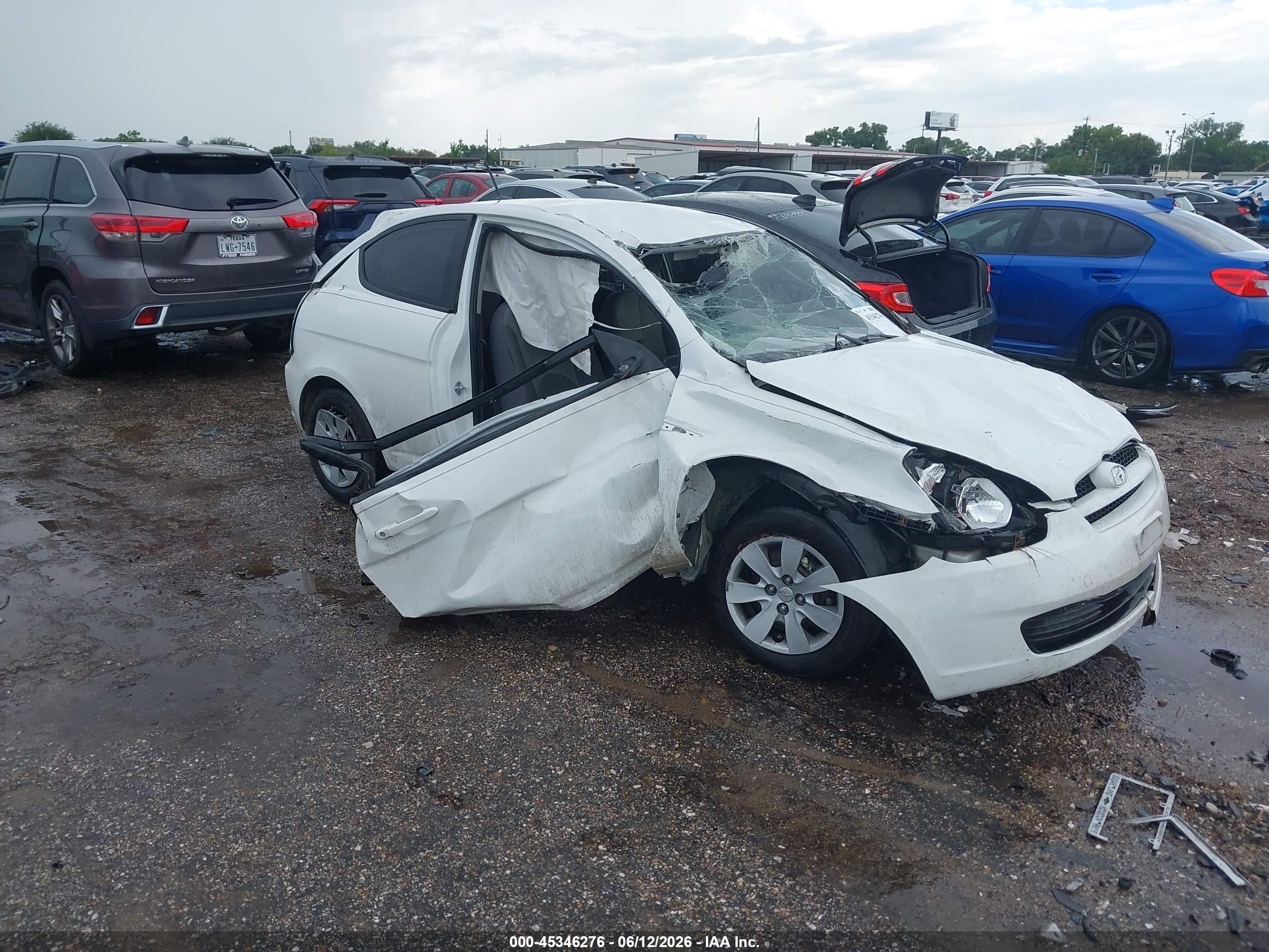 2010 Hyundai Accent Blue, VIN KMHCM3AC8AU174366 — Rollover