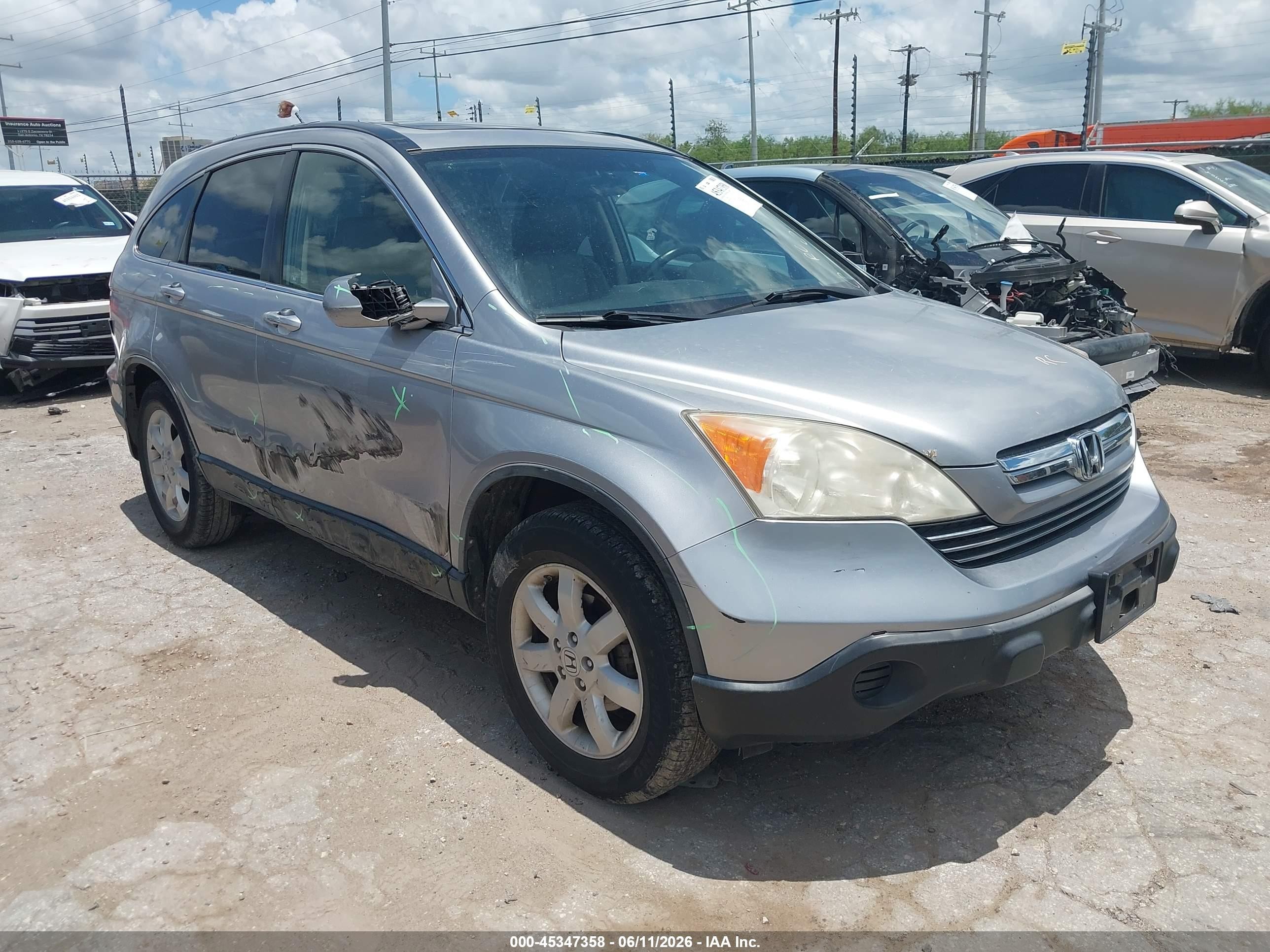2007 Honda CR-V EX-L, VIN JHLRE48797C085286 — Side