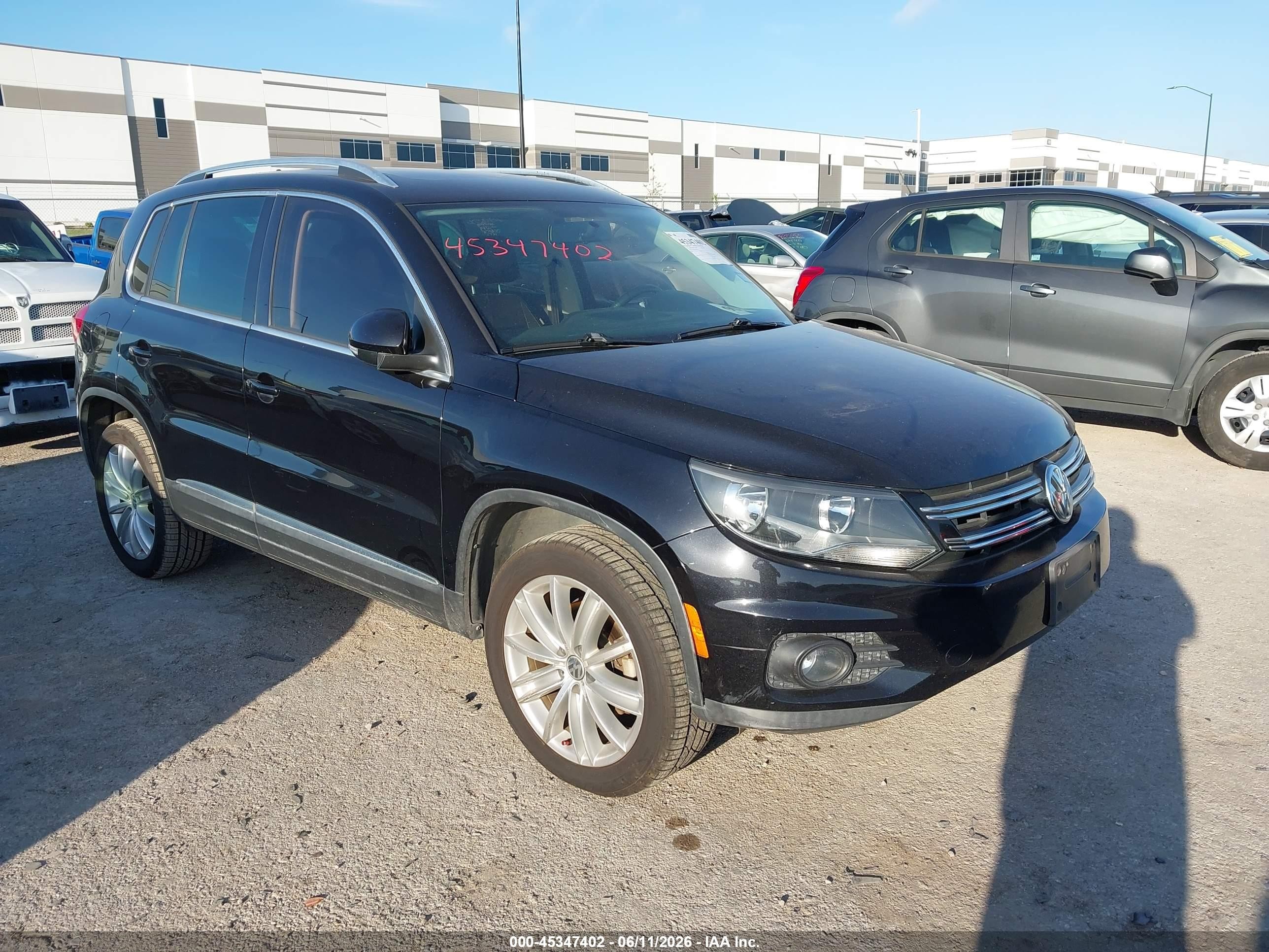 2014 Volkswagen Tiguan S, VIN WVGAV3AX2EW569614 — Water / flood