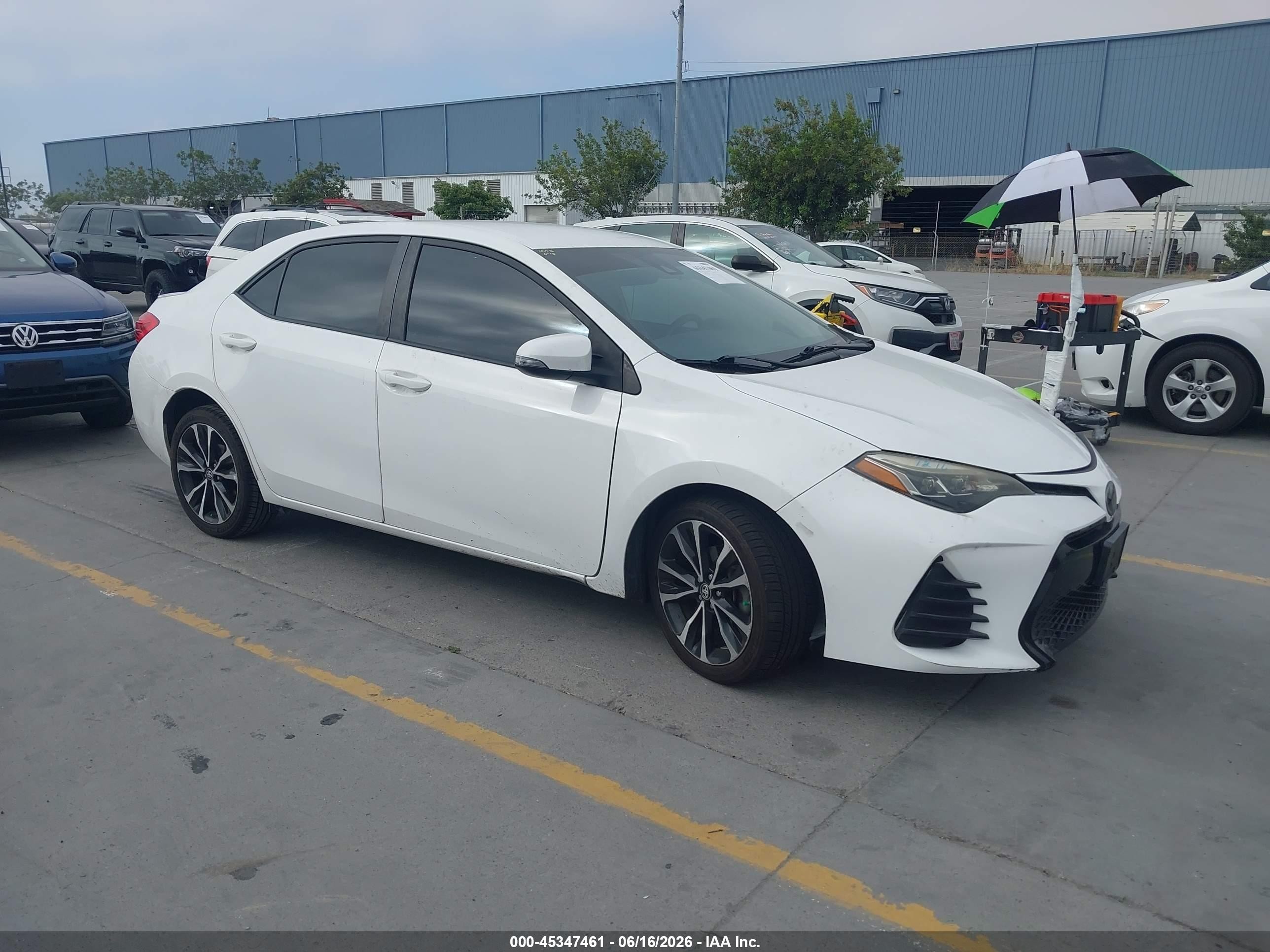 2019 Toyota Corolla LE, VIN 2T1BURHE8KC207097 — Auction photo 1 of 6