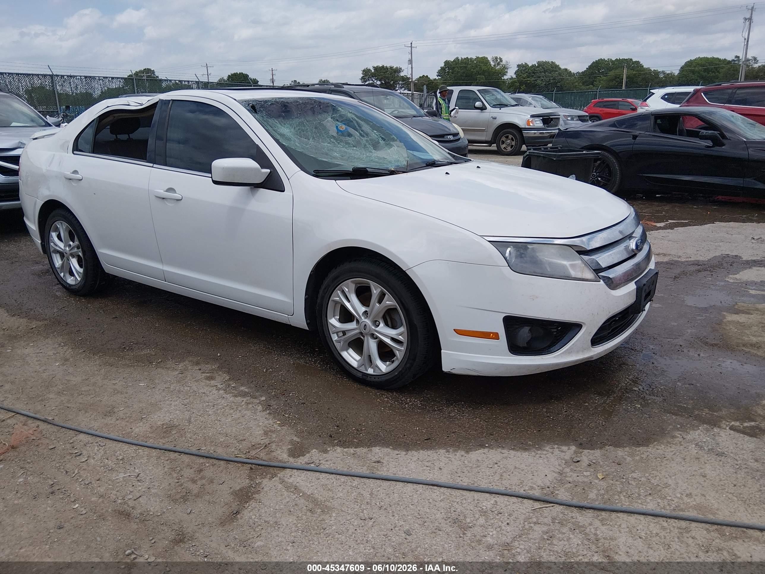 2012 Ford Fusion SE, VIN 3FAHP0HA5CR205111 — Storm