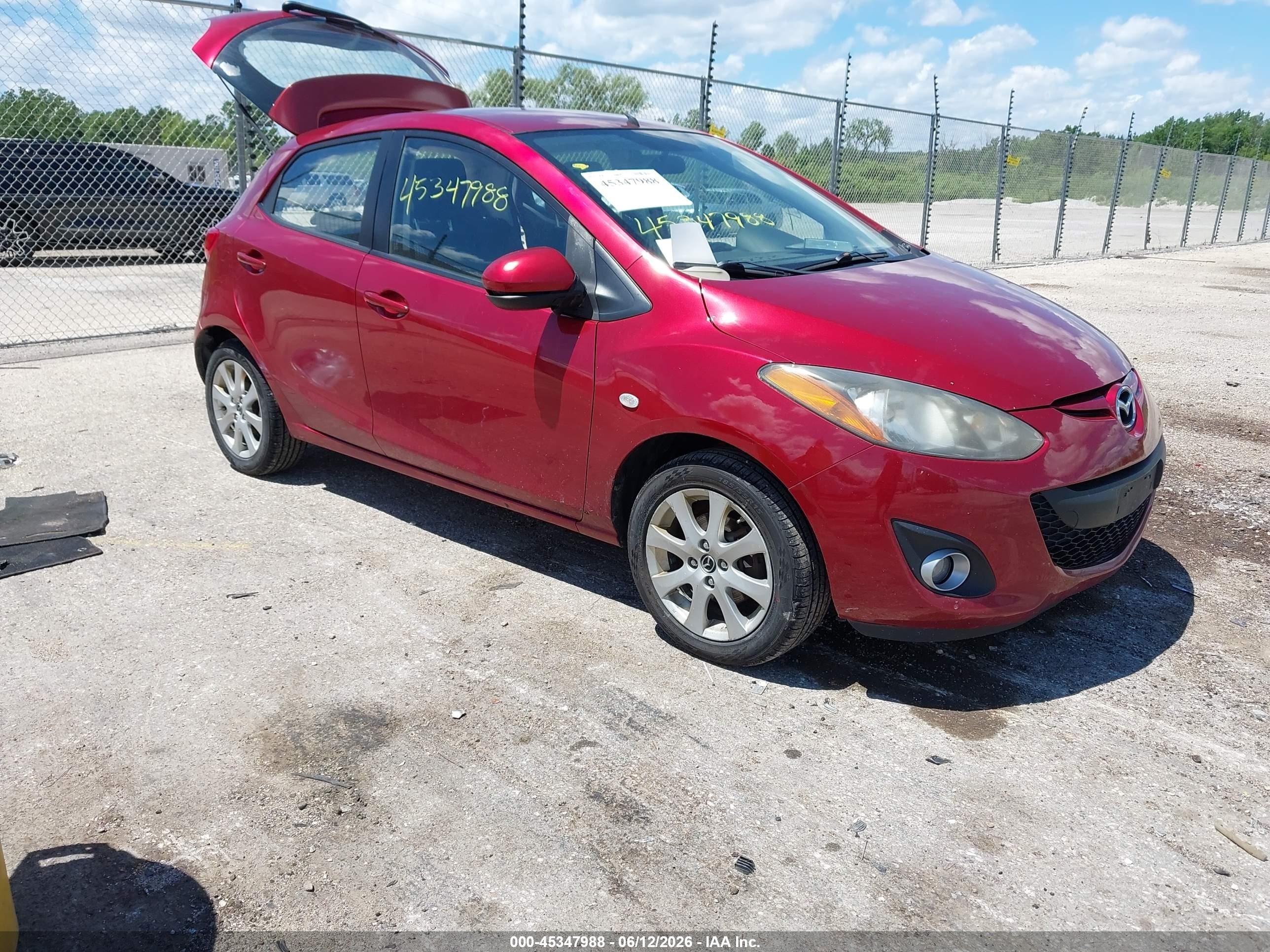 2014 Mazda 2 Touring, VIN JM1DE1LY0E0183840 — Side