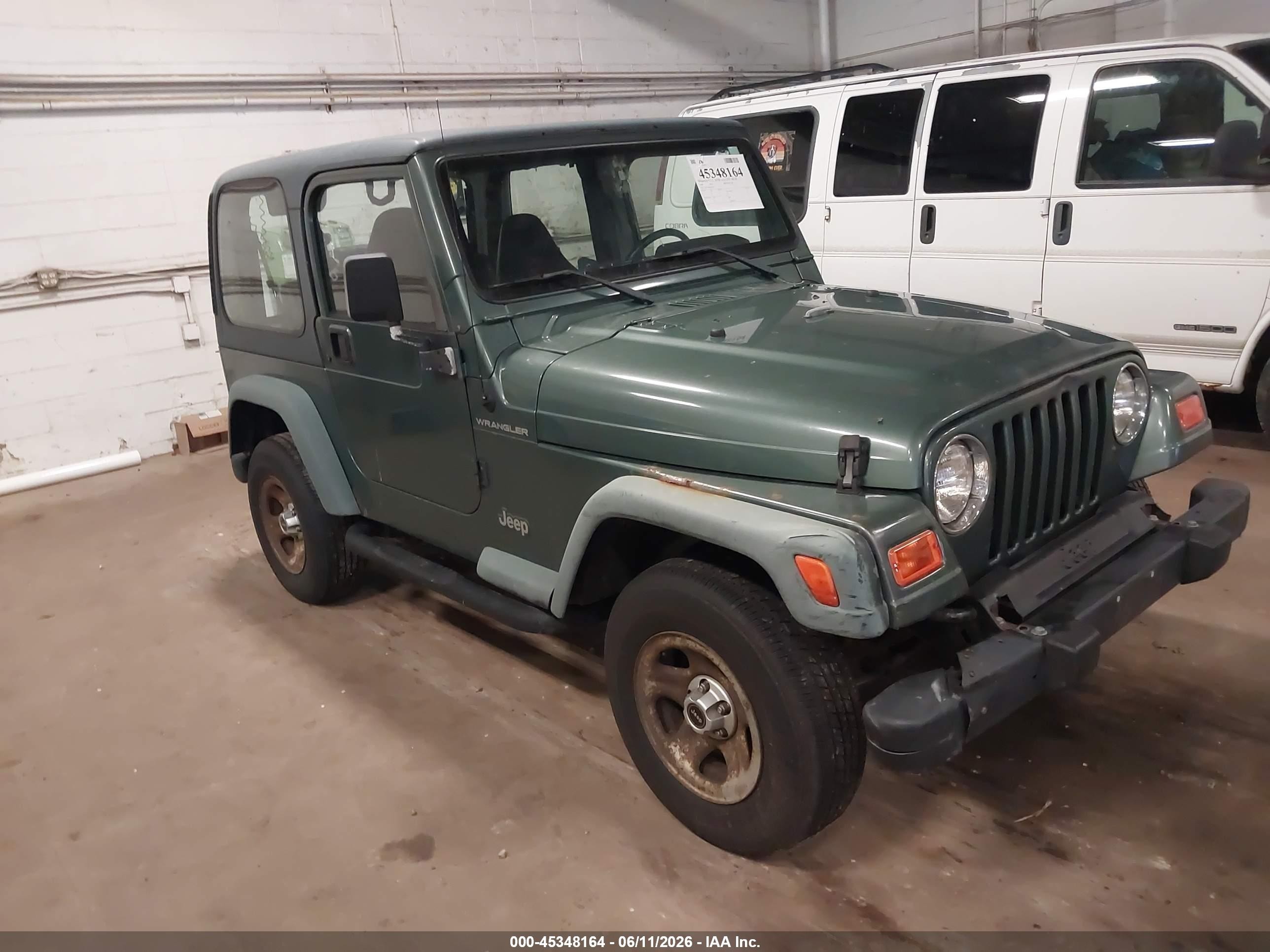 1999 Jeep Wrangler SE, VIN 1J4FY29P4XP407121 — Normal wear