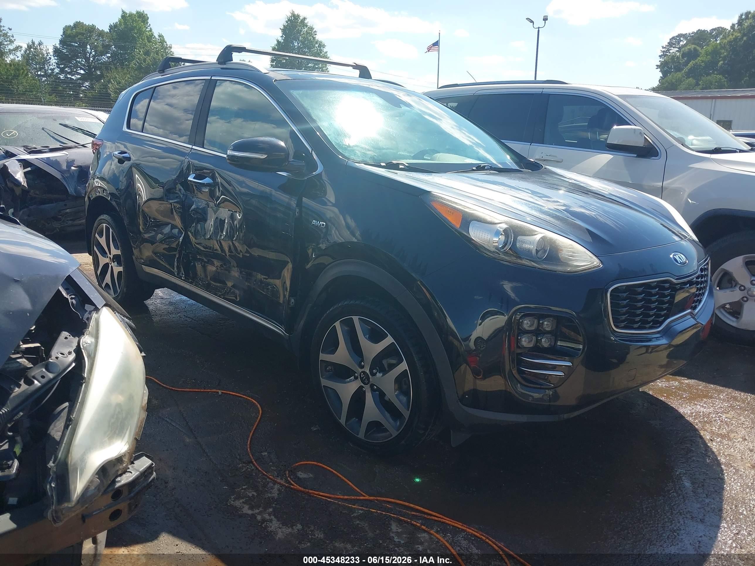 2017 Kia Sportage SX Turbo, VIN KNDPRCA61H7209064 — Side
