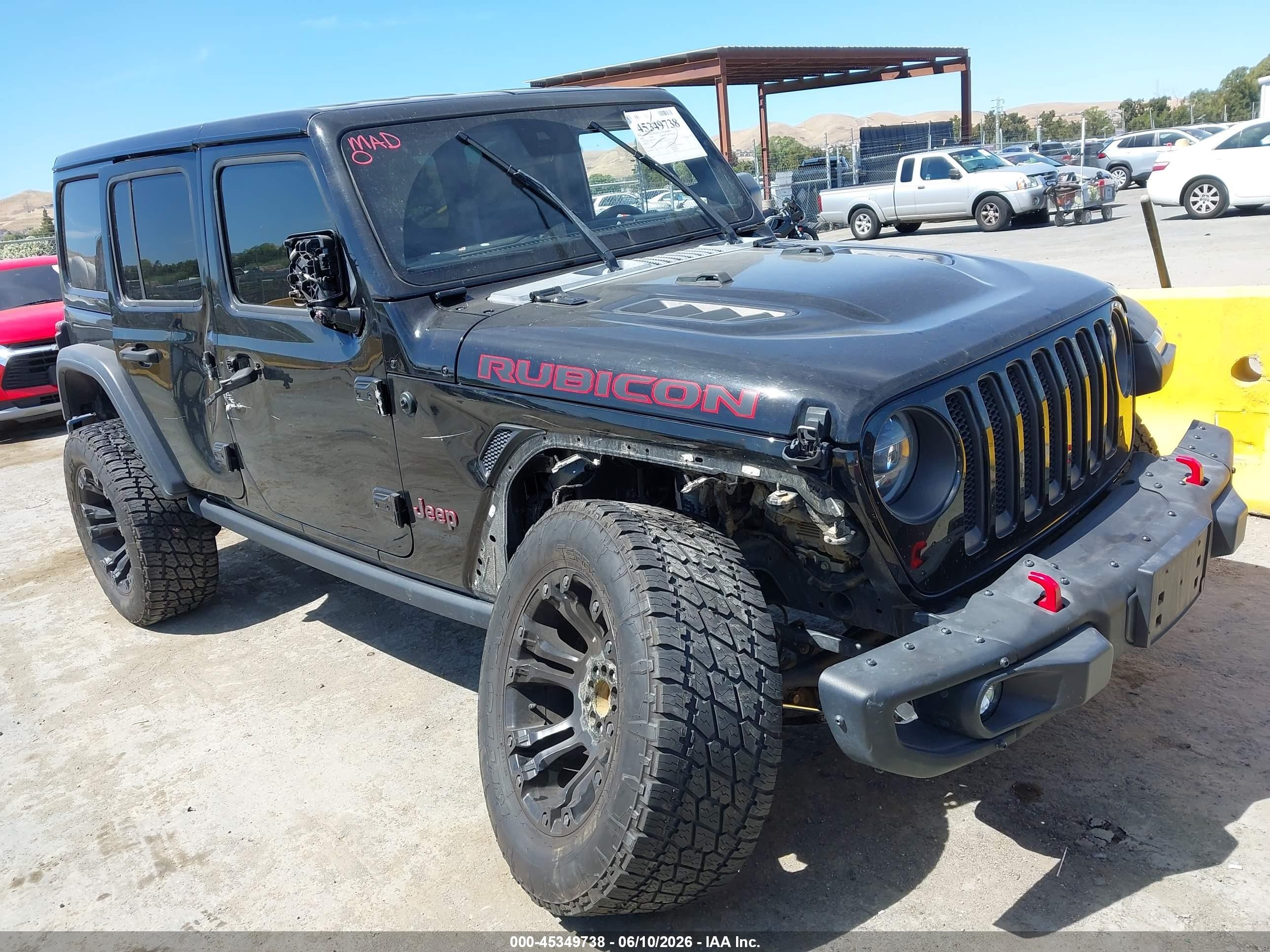 2021 Jeep Wrangler Unlimited Rubicon, VIN 1C4JJXFM4MW543231 — Side