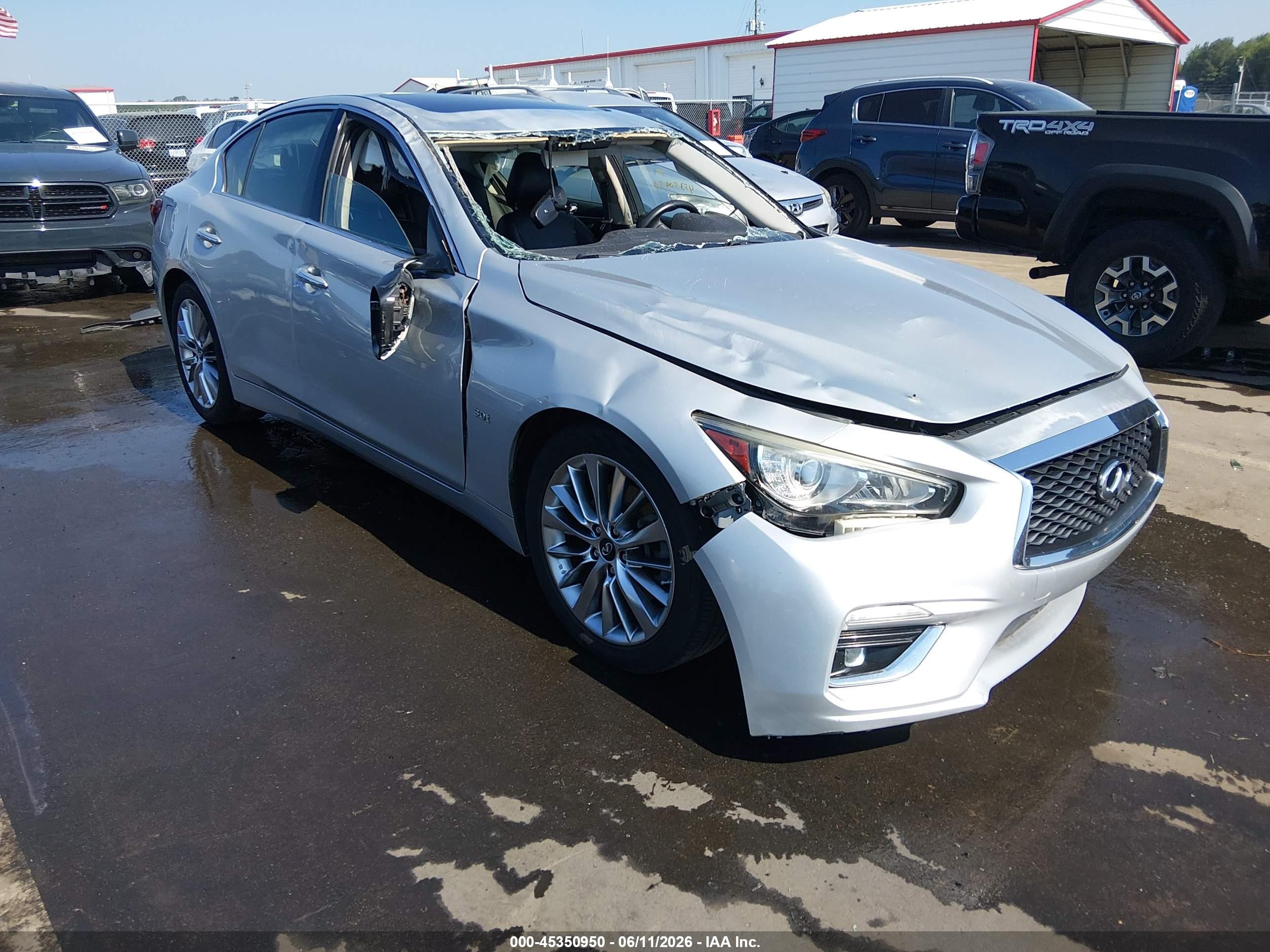 2019 Infiniti Q50 Luxe, VIN JN1EV7AP8KM519193 — Side