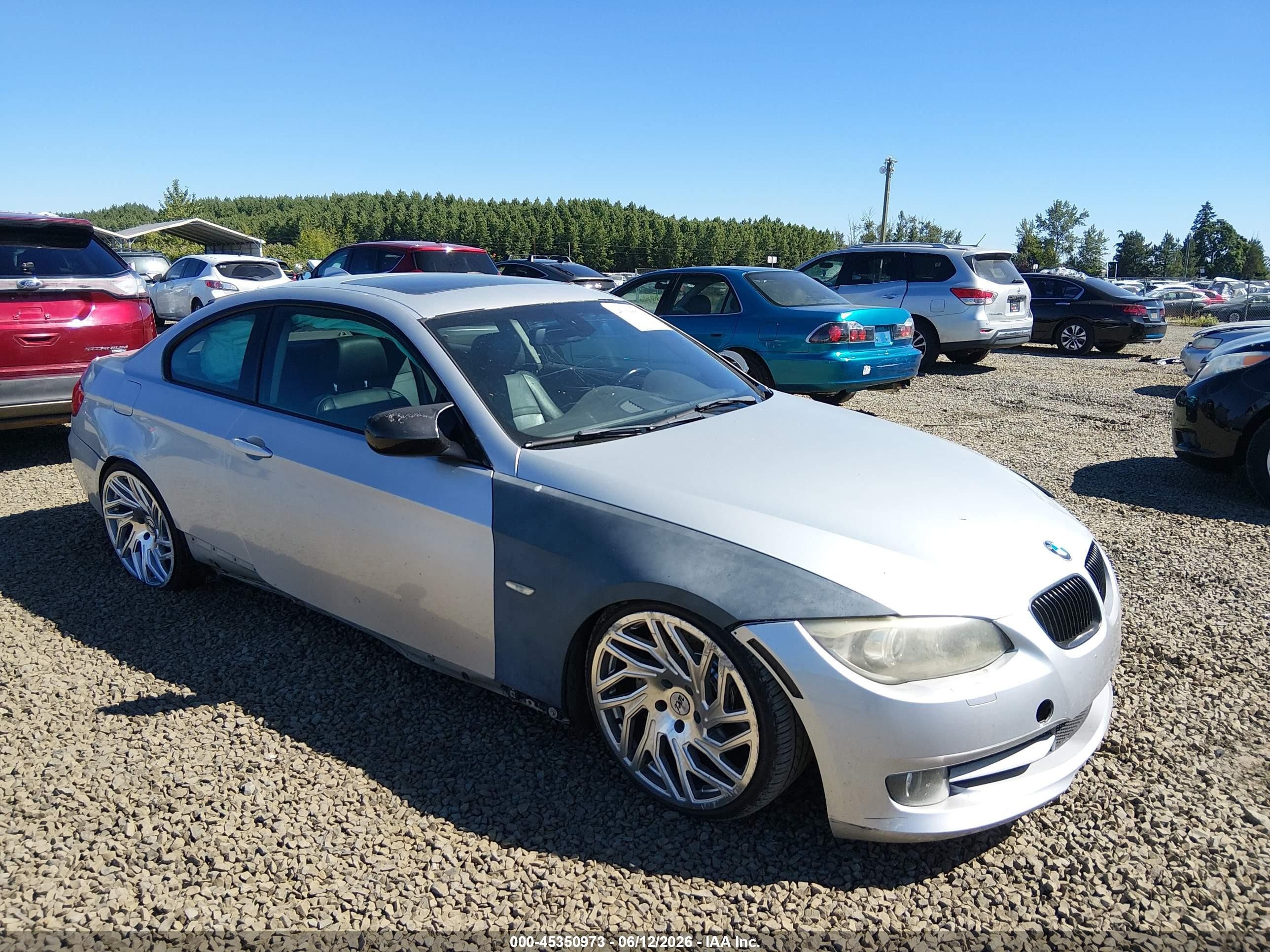 2011 BMW 3 Series 335i, VIN WBAKG7C50BE262737 — Side