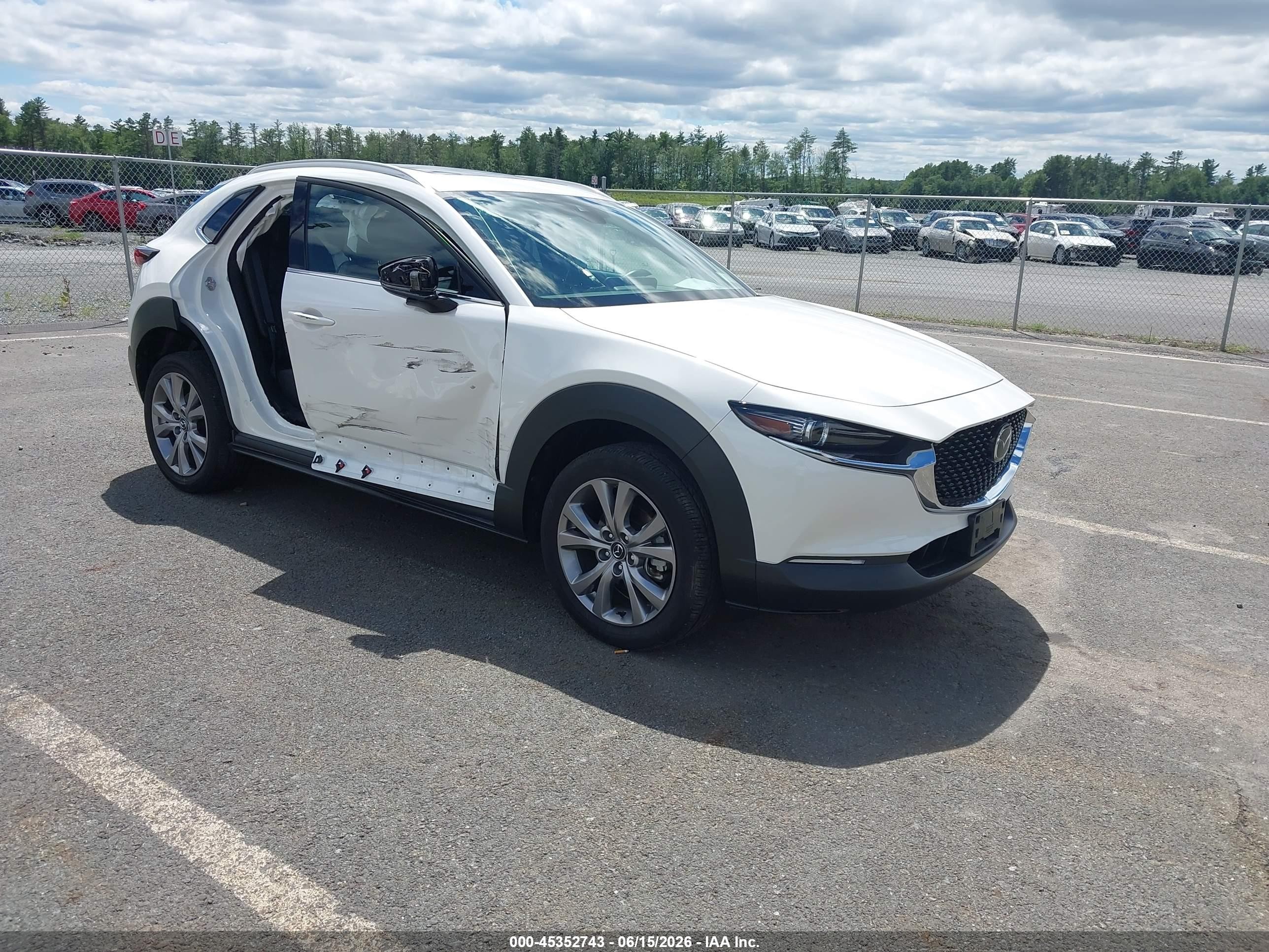 2022 Mazda CX-30 S Premium, VIN 3MVDMBDL2NM414485 — Side