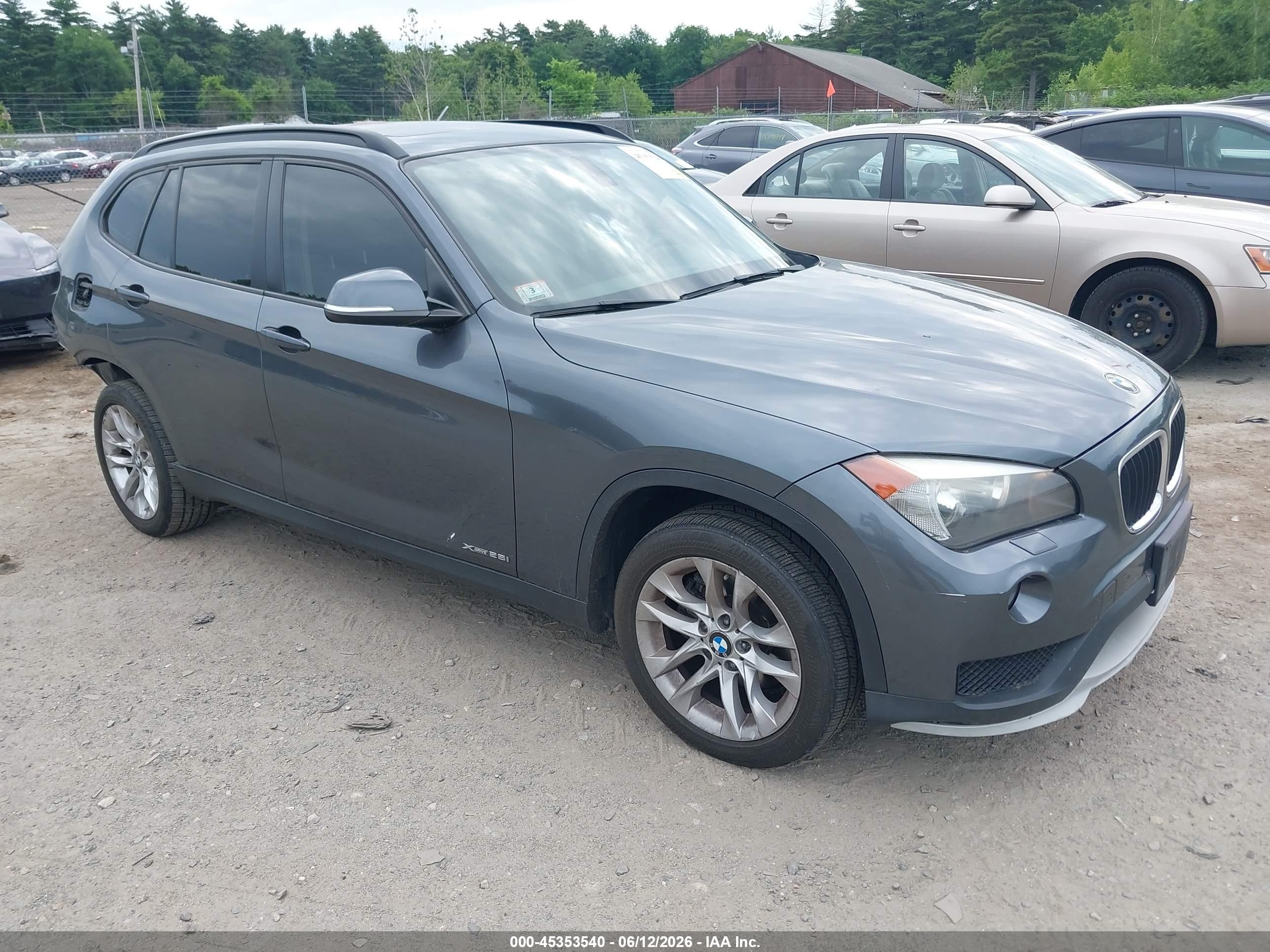 2015 BMW X1 xDrive28i, VIN WBAVL1C59FVY33671 — Rear end