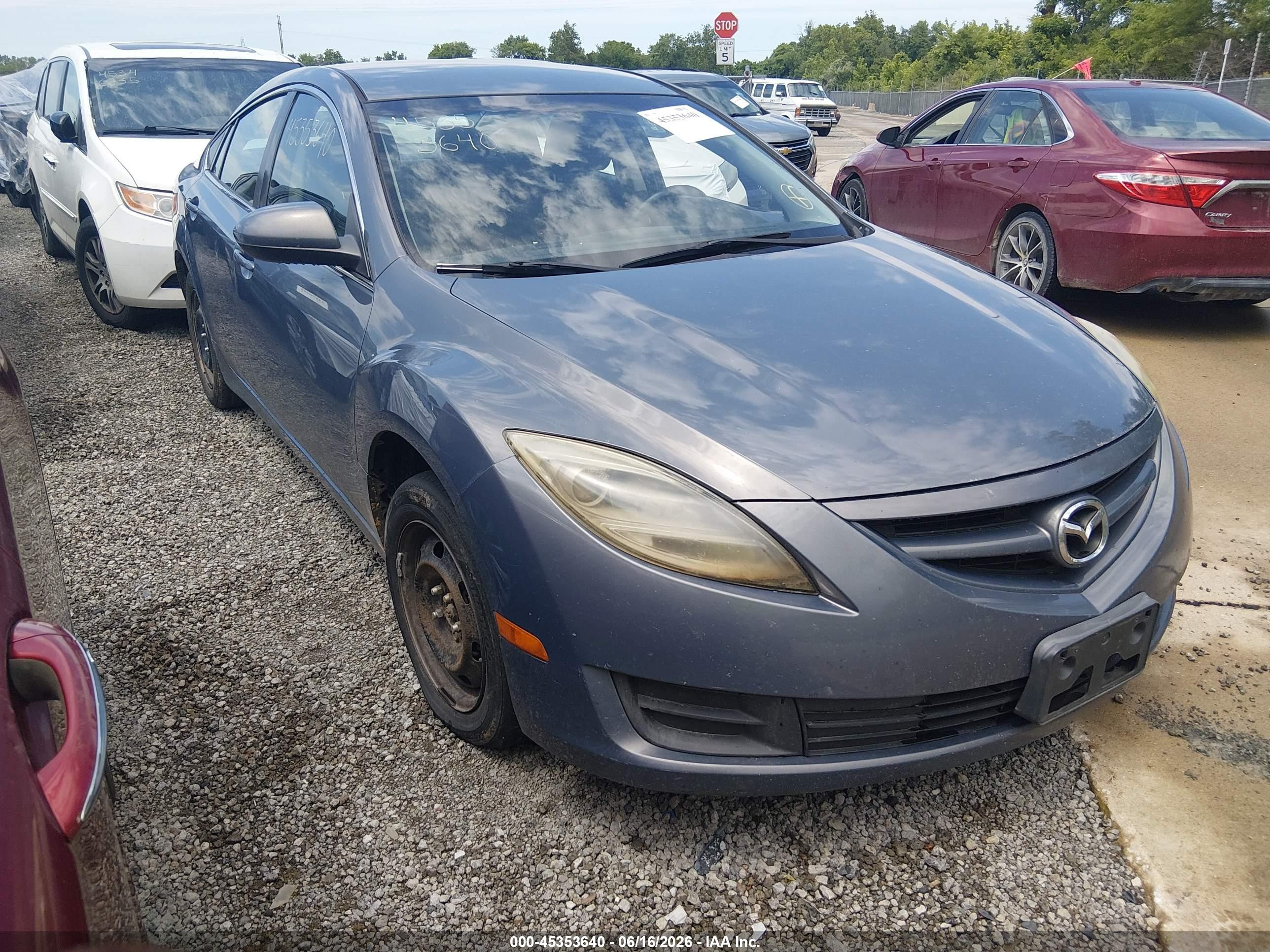 2010 Mazda 6 i Sport, VIN 1YVHZ8BH2A5M33716 — Side