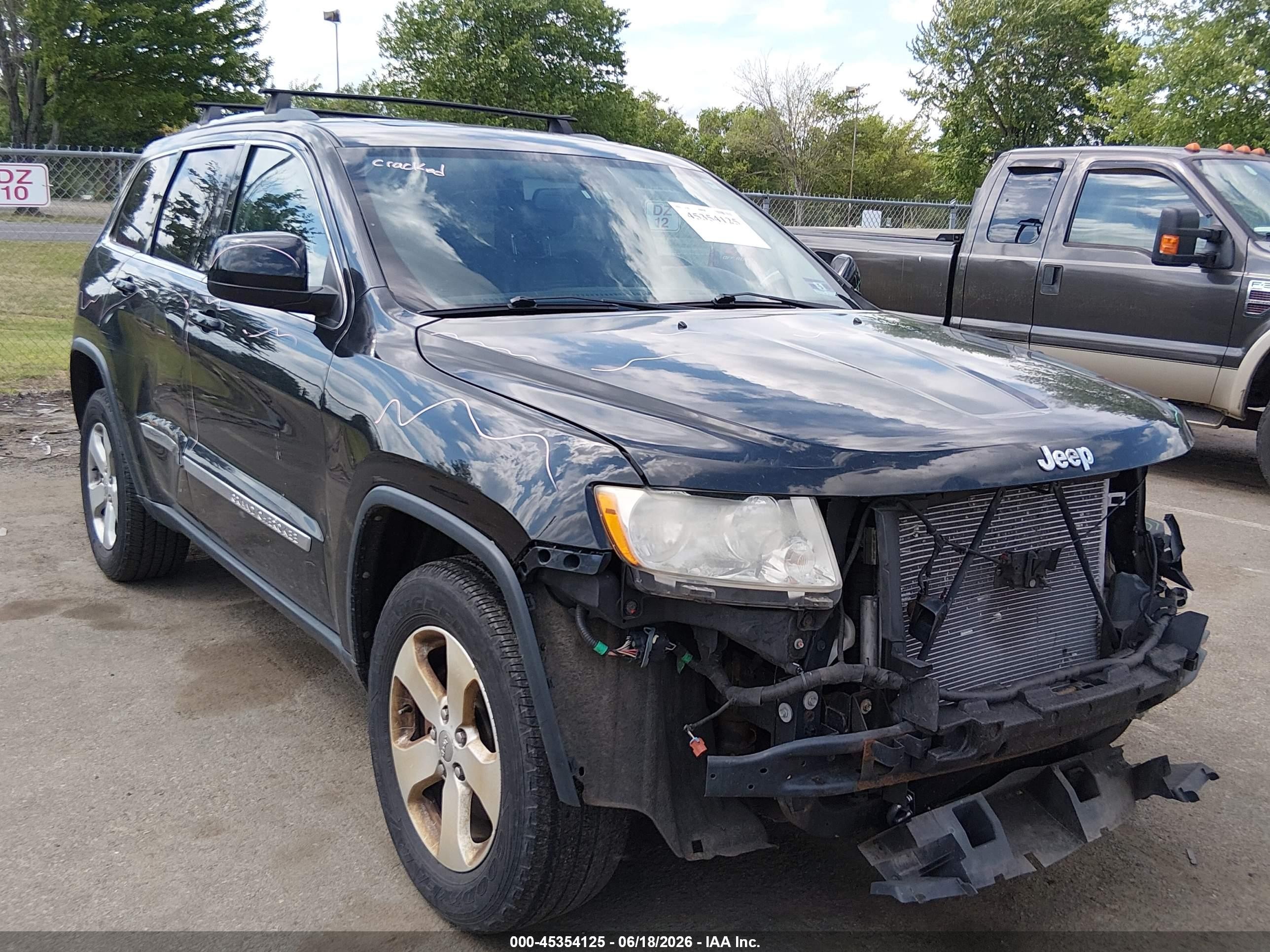 2012 Jeep Grand Cherokee Laredo, VIN 1C4RJFAG8CC348697 — Front end