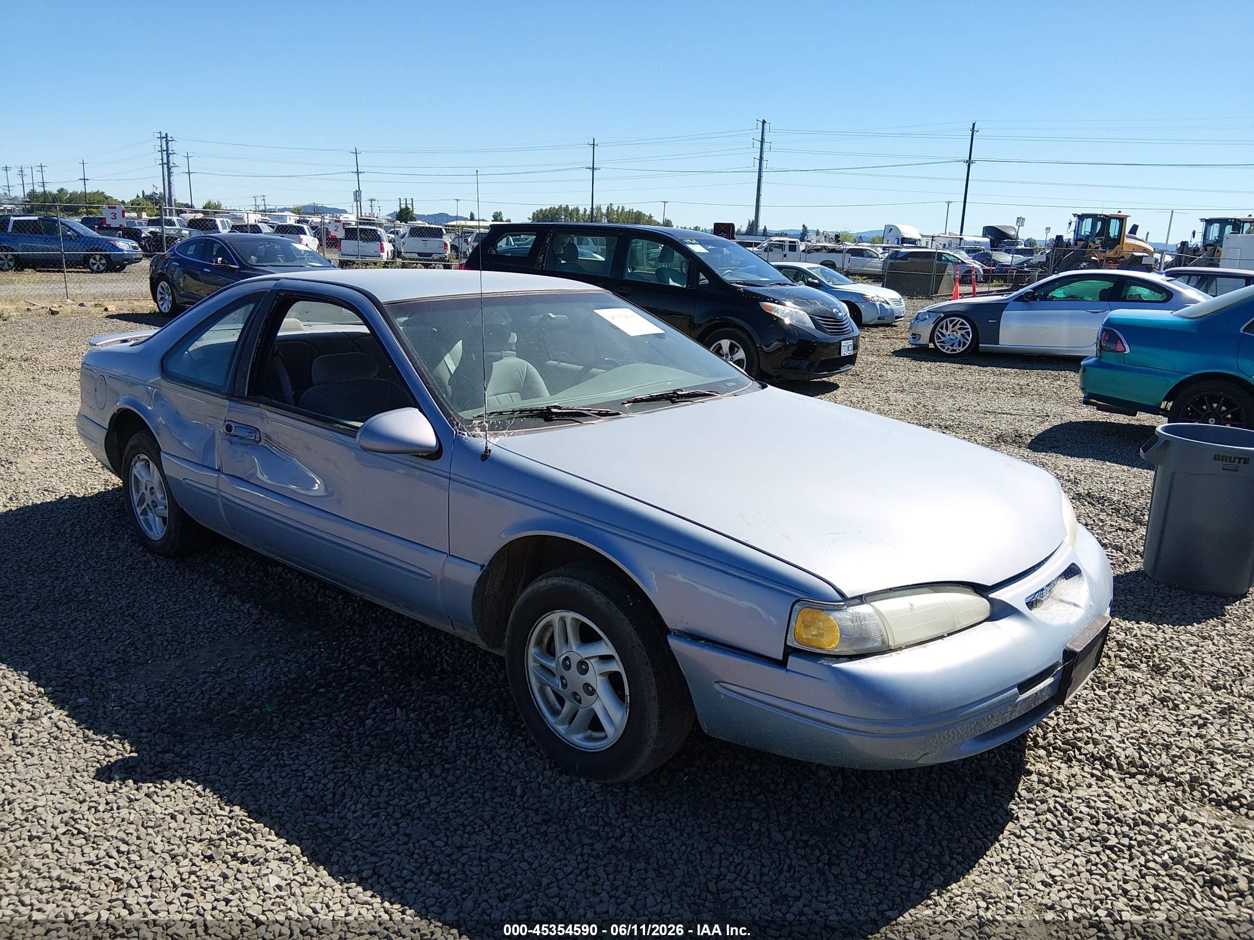 1996 Ford Thunderbird LX, VIN 1FALP62WXTH121501 — Side