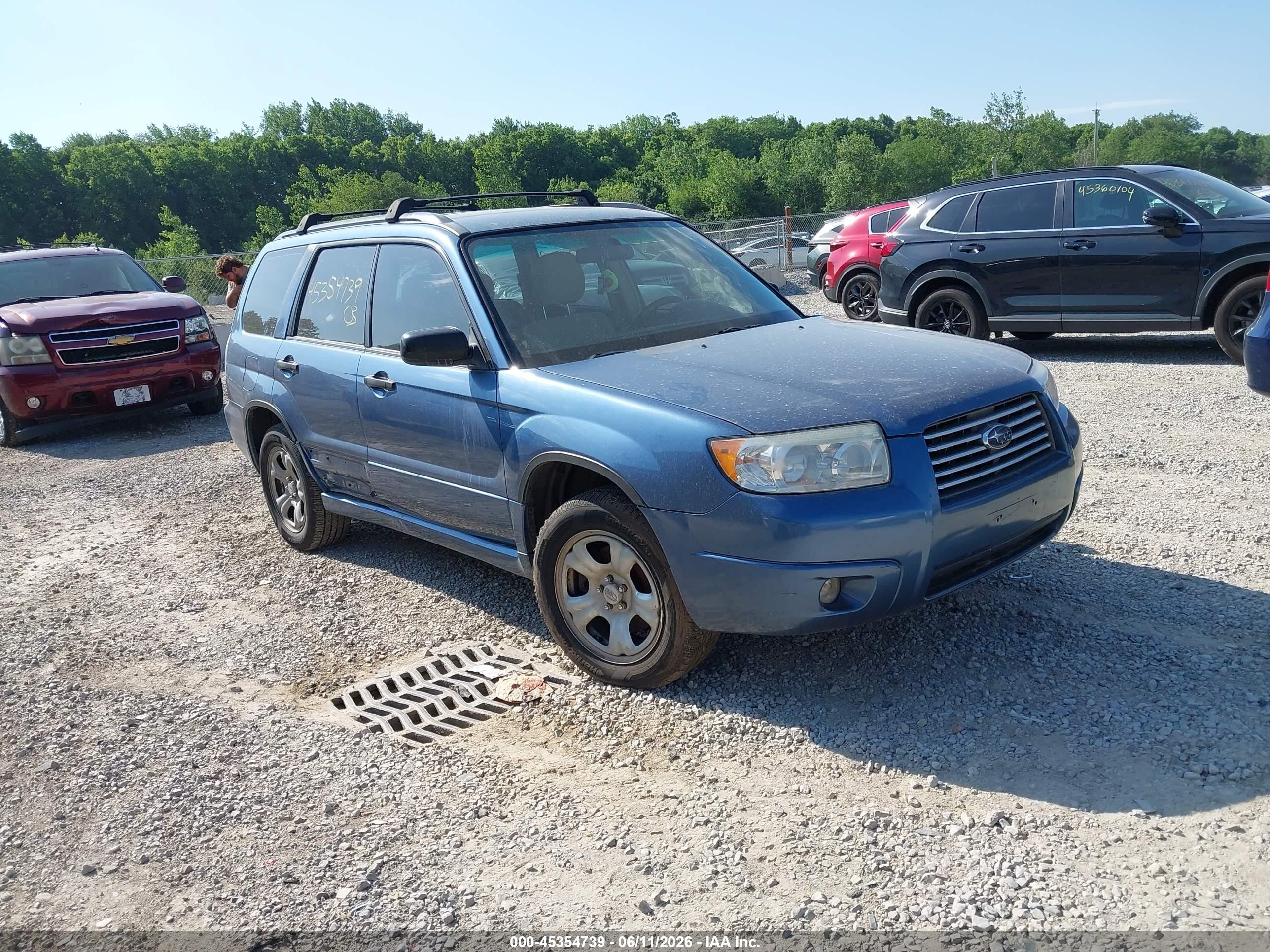 2007 Subaru Forester X, VIN JF1SG63617H728306 — Зад