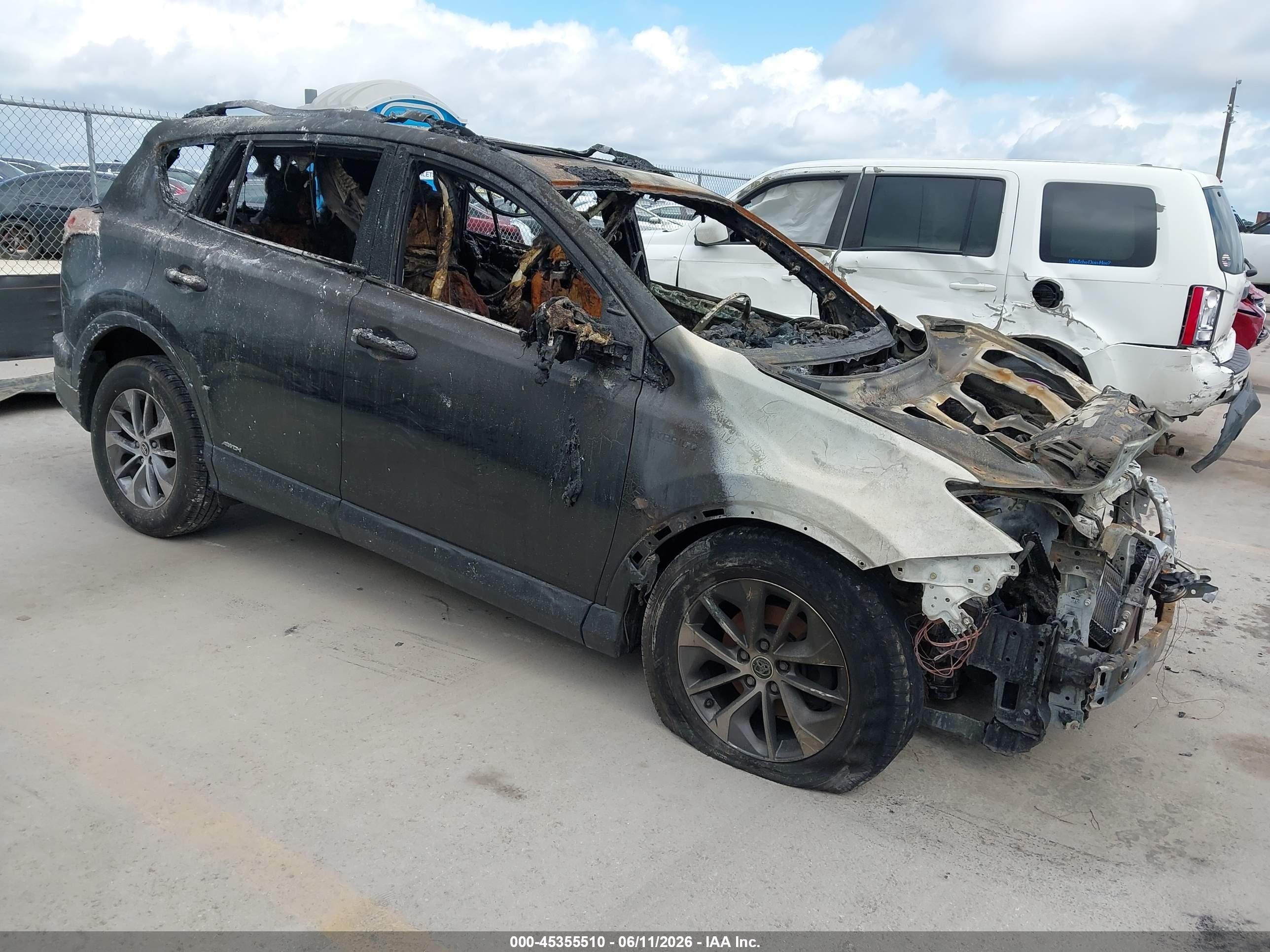 2018 Toyota RAV4 Hybrid XLE, VIN JTMRJREV1JD194416 — Burn