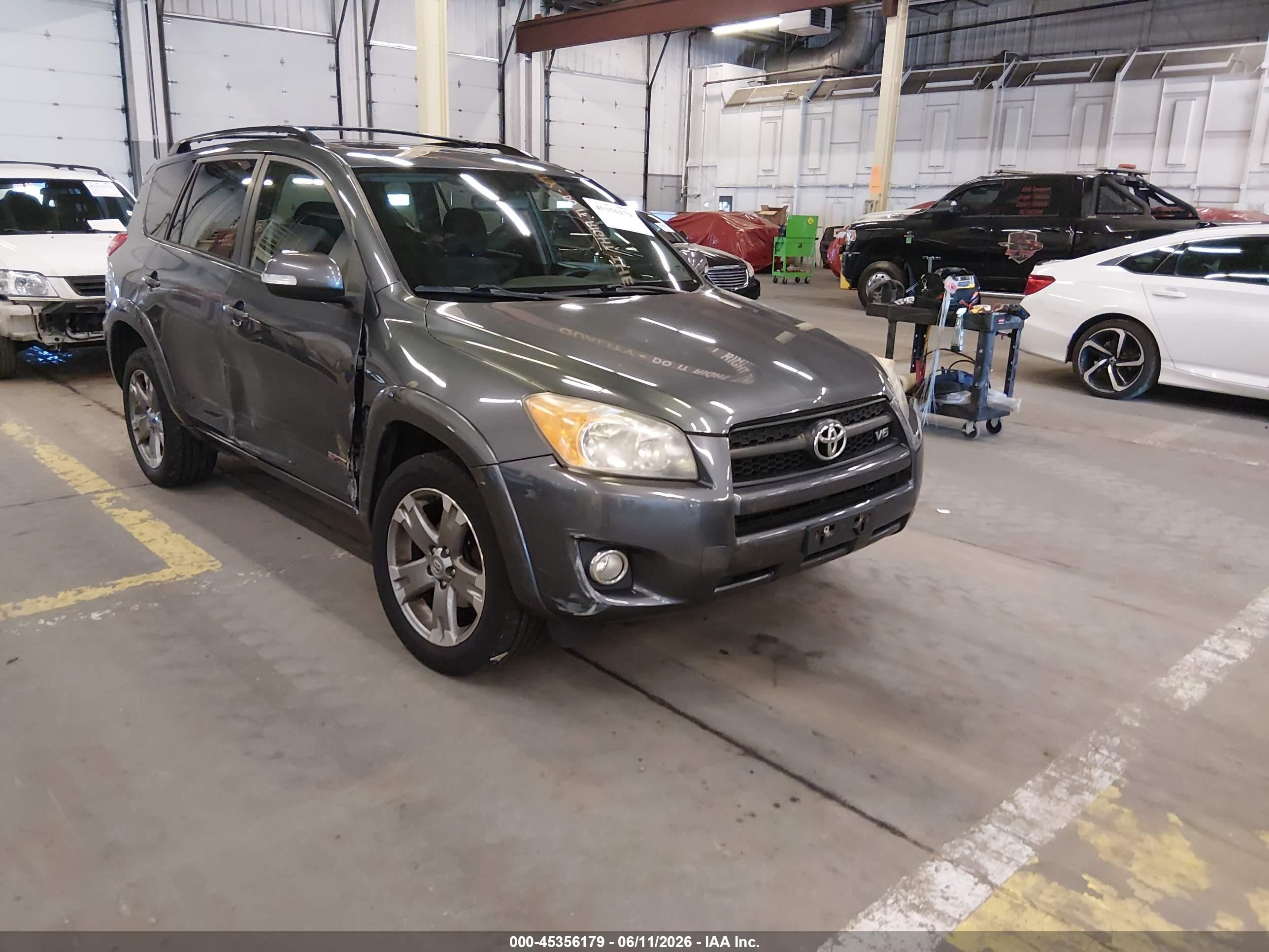 2010 Toyota RAV4 Sport, VIN JTMRK4DV6A5098177 — Side