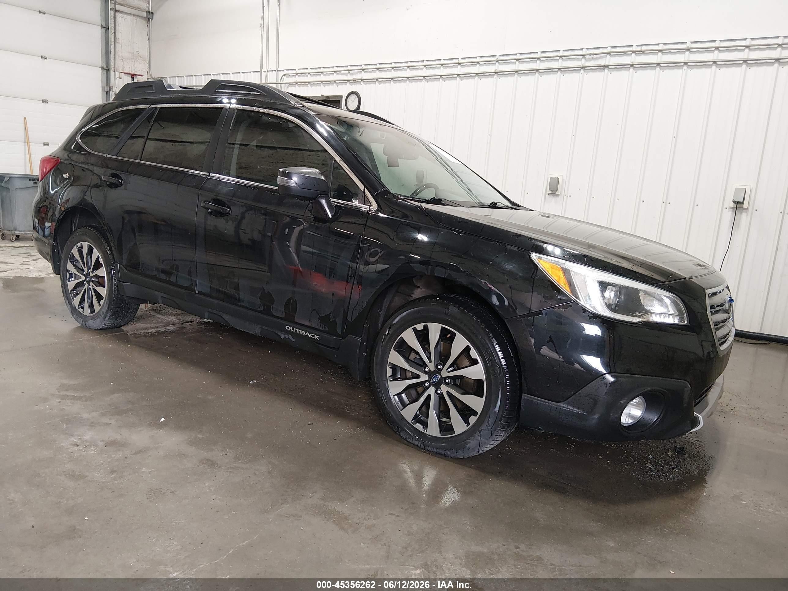2016 Subaru Outback Limited, VIN 4S4BSENC2G3253635 — Side