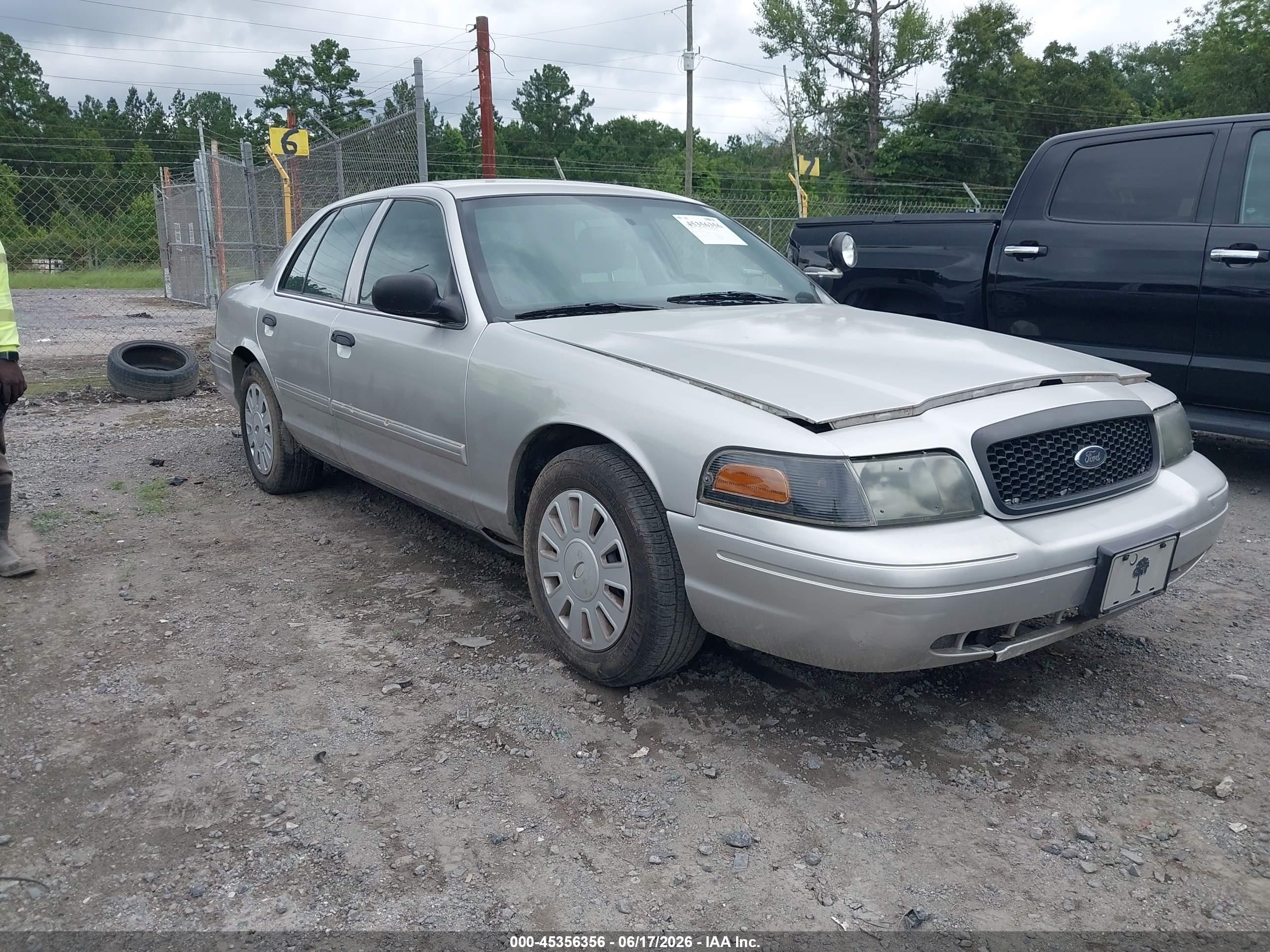 2010 Ford Police Interceptor, VIN 2FABP7BV7AX118710 — Side