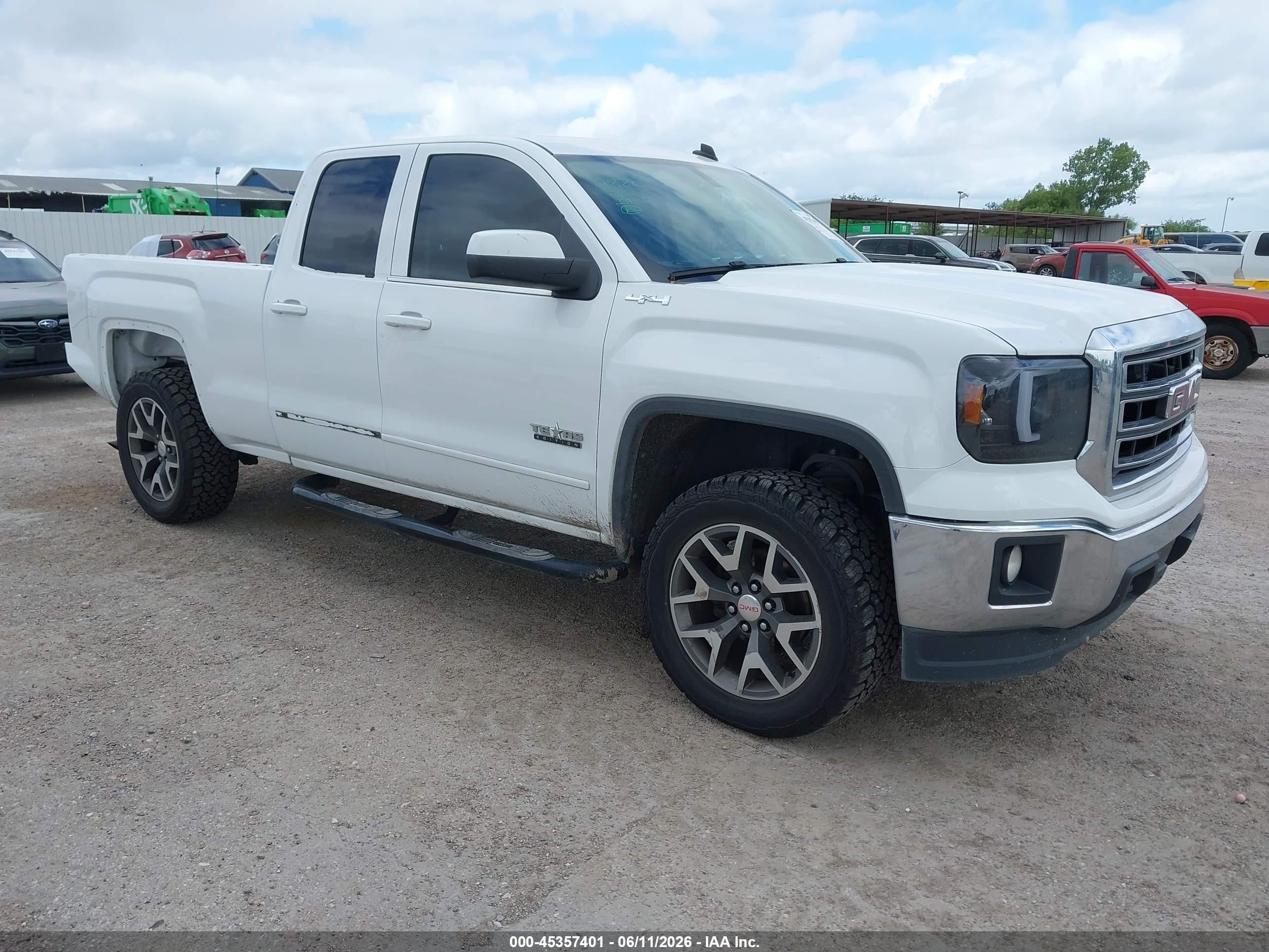 2014 GMC Sierra 1500 SLE, VIN 1GTV2UEH2EZ217915 — Rear end