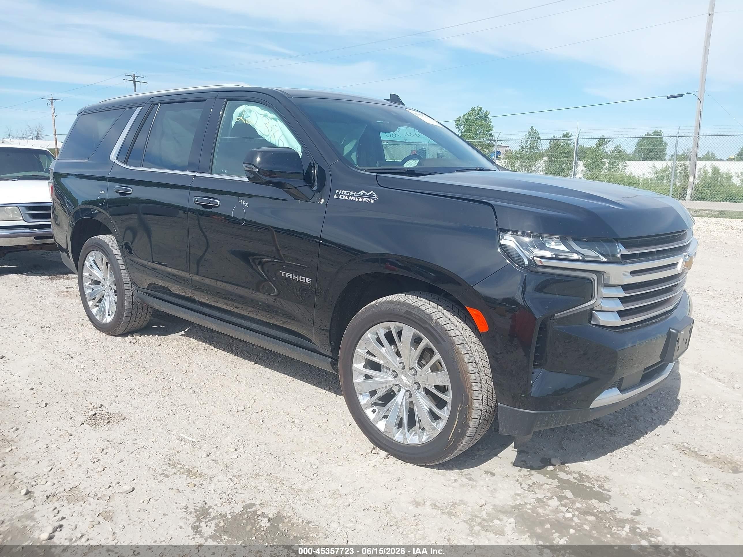 2021 Chevrolet Tahoe High Country, VIN 1GNSKTKL0MR153983 — Side