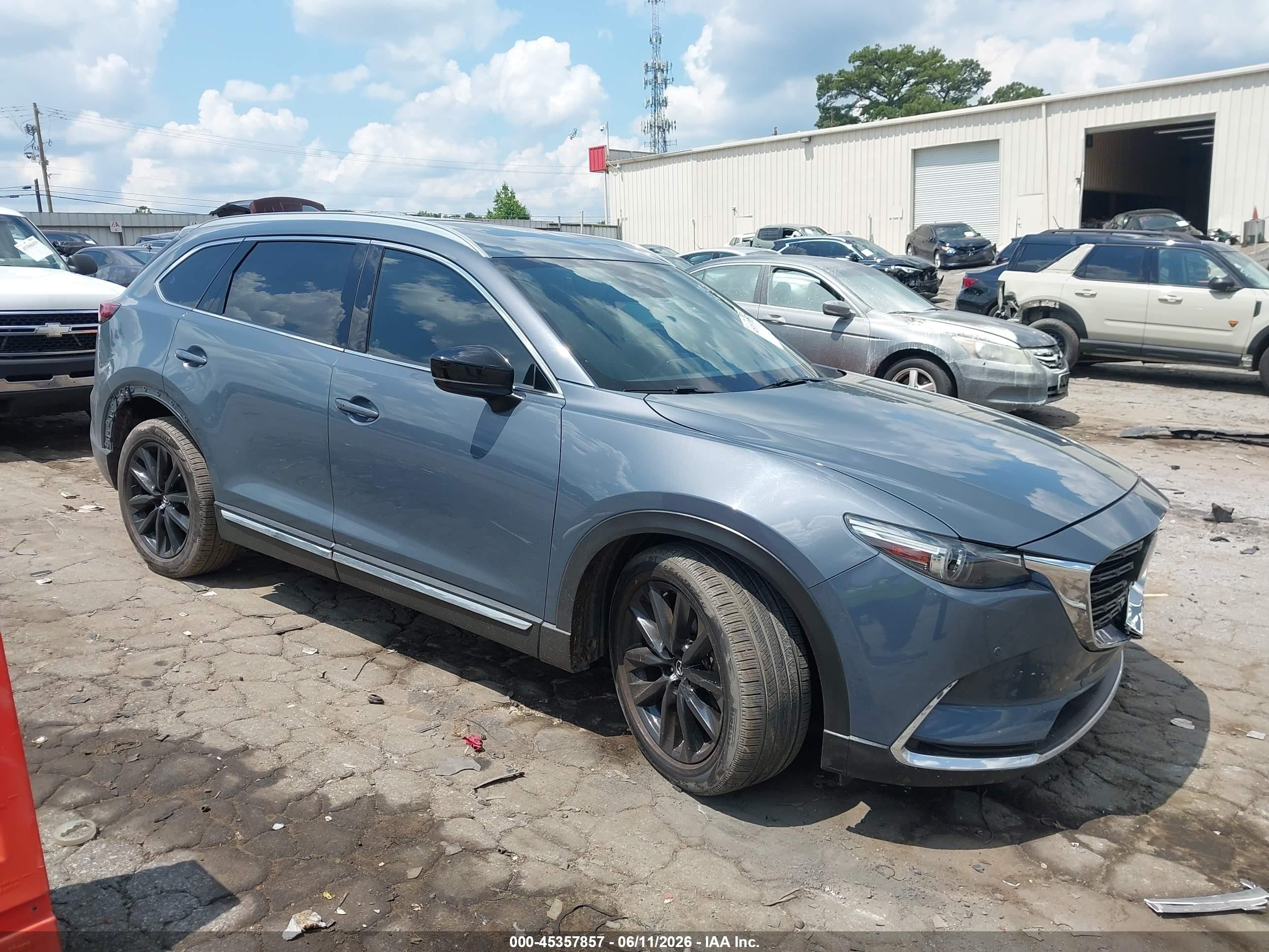 2021 Mazda CX-9 Carbon Edition, VIN JM3TCADY0M0502904 — Side
