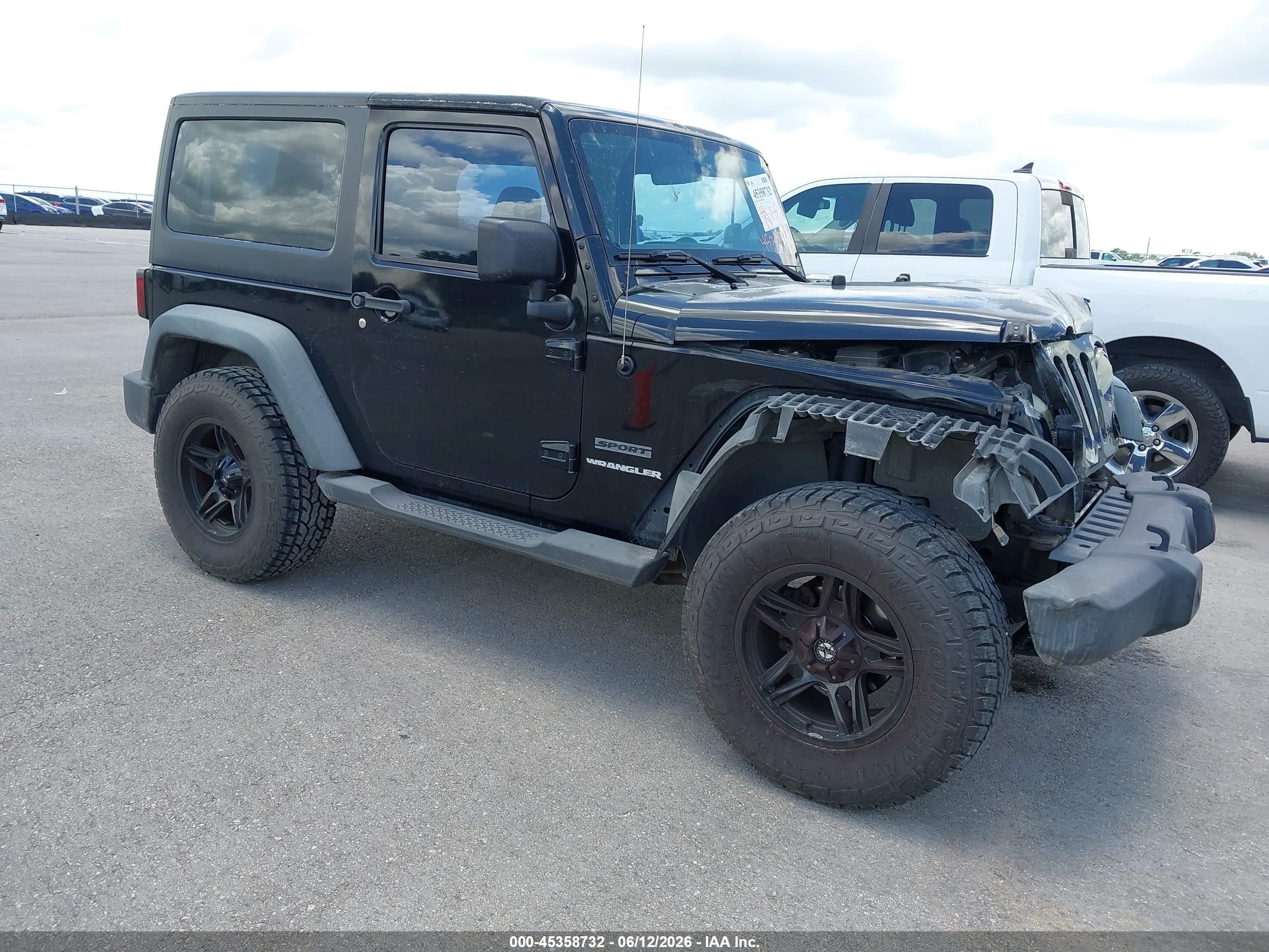 2011 Jeep Wrangler Sport, VIN 1J4AA2D19BL580604 — Front end