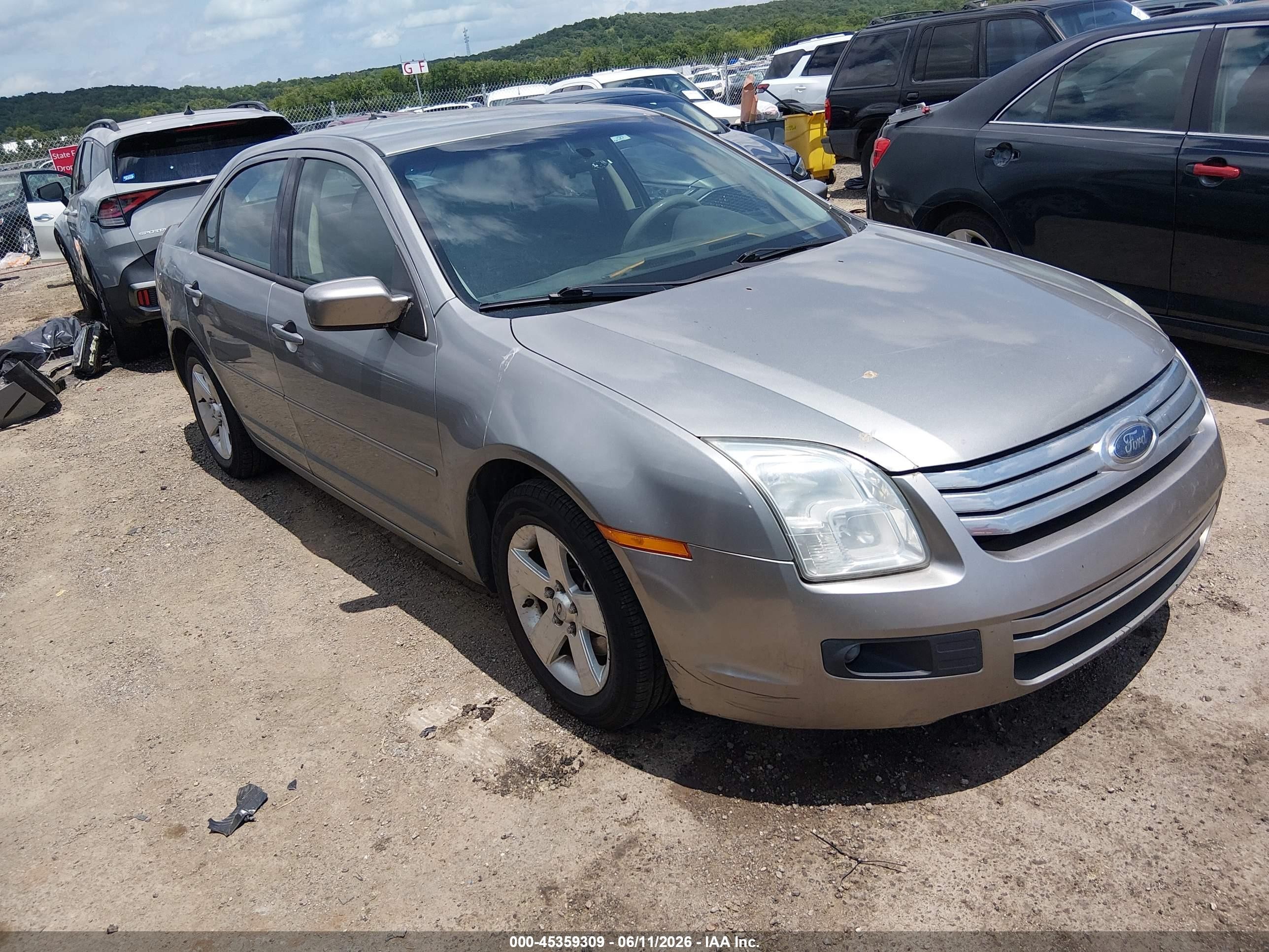 2009 Ford Fusion SE, VIN 3FAHP07Z59R143953 — Бок