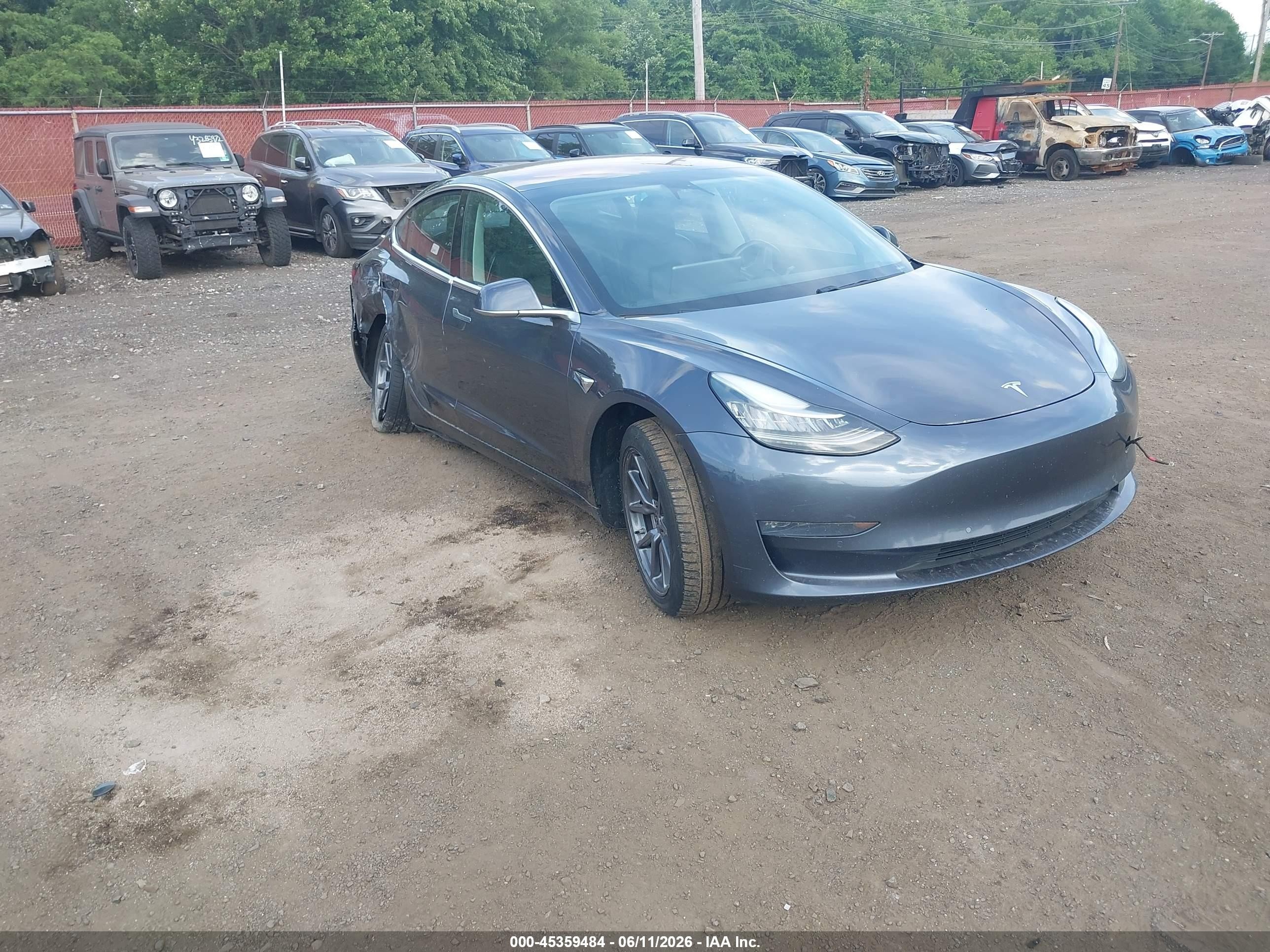 2018 Tesla Model 3 Long Range Battery, VIN 5YJ3E1EA7JF025762 — Side