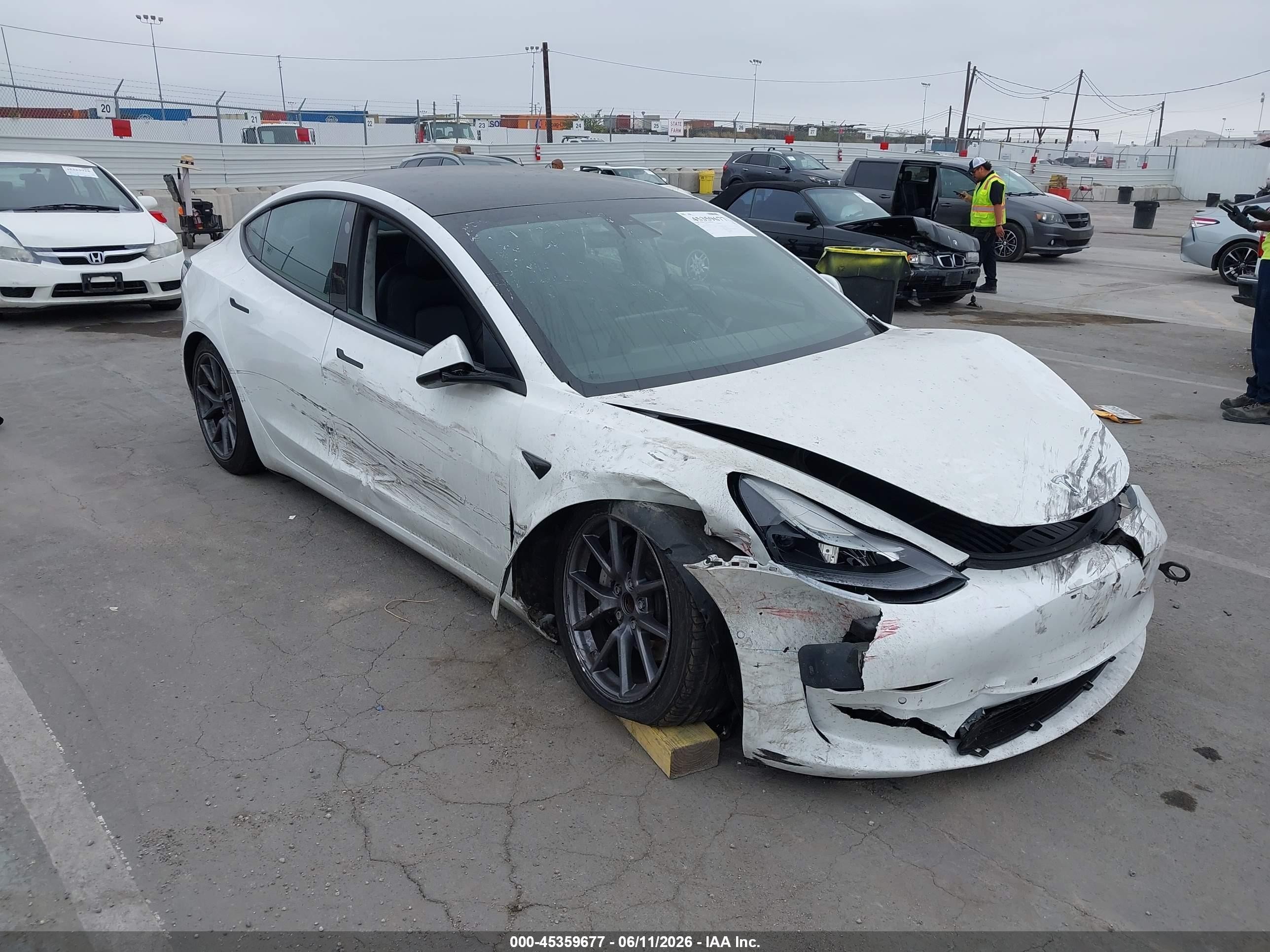 2021 Tesla Model 3 Standard Range Plus, VIN 5YJ3E1EA8MF074960 — Front end