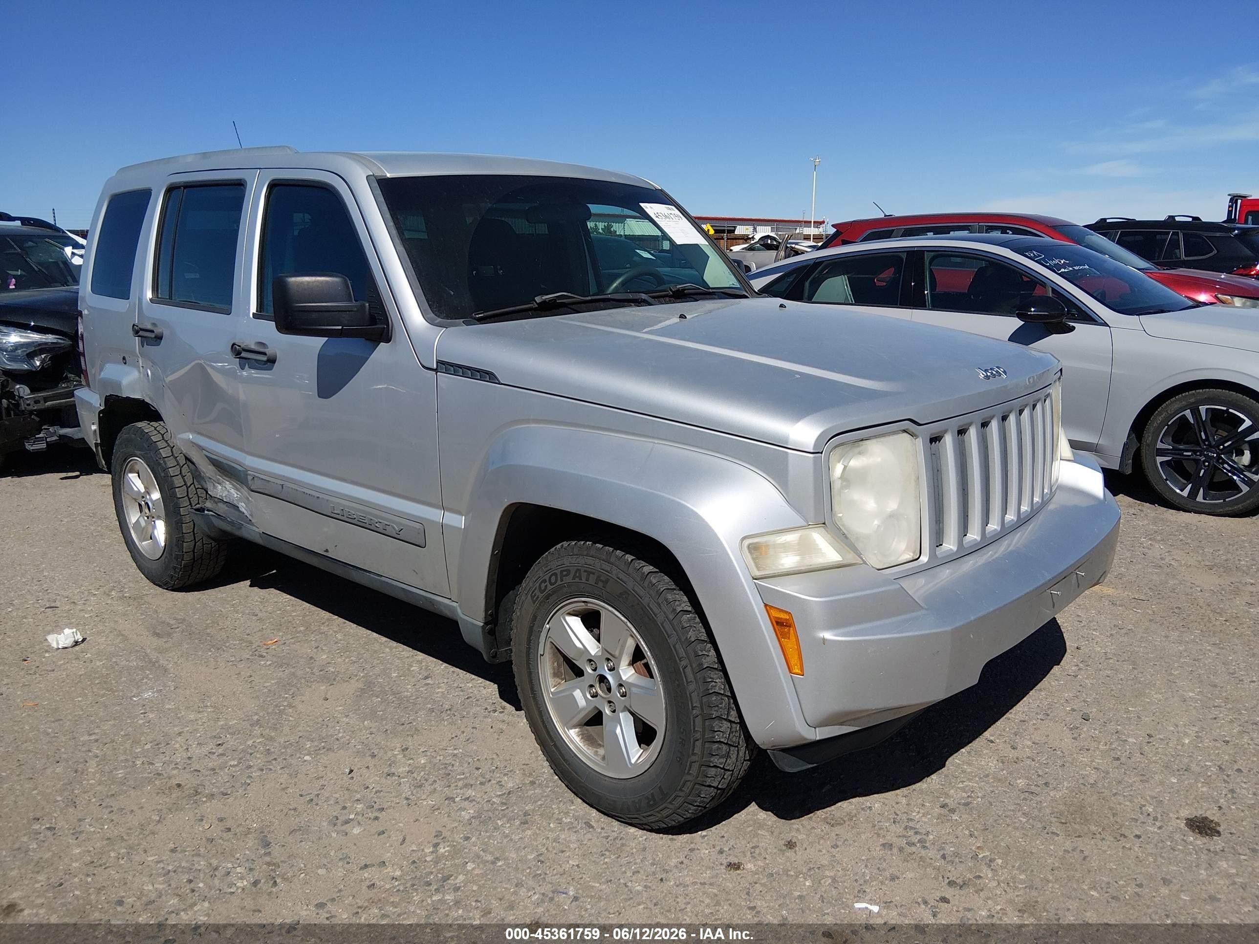 2011 Jeep Liberty Sport, VIN 1J4PN2GK6BW548243 — Side