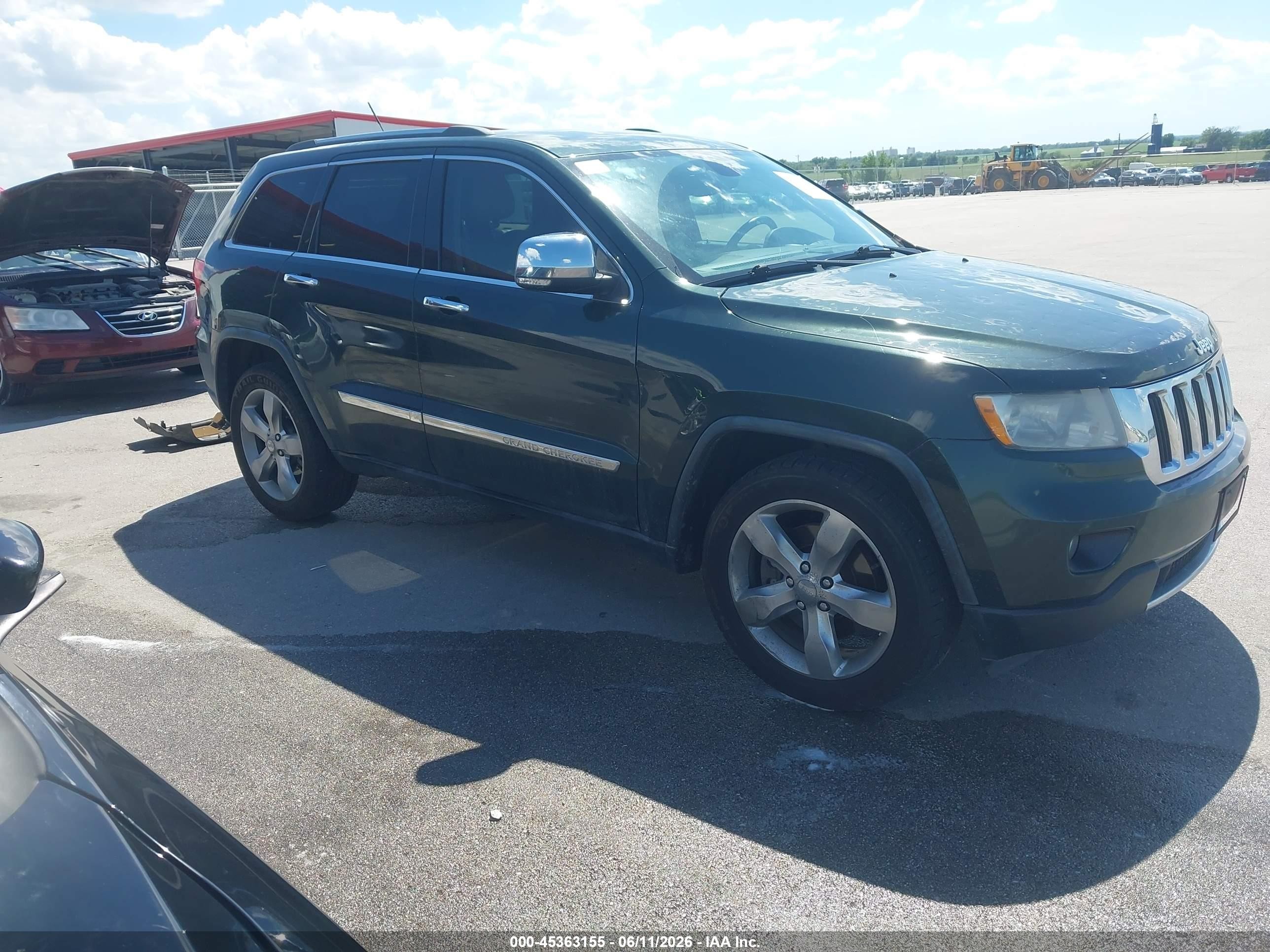 2011 Jeep Grand Cherokee Limited, VIN 1J4RR5GT7BC547076 — Side