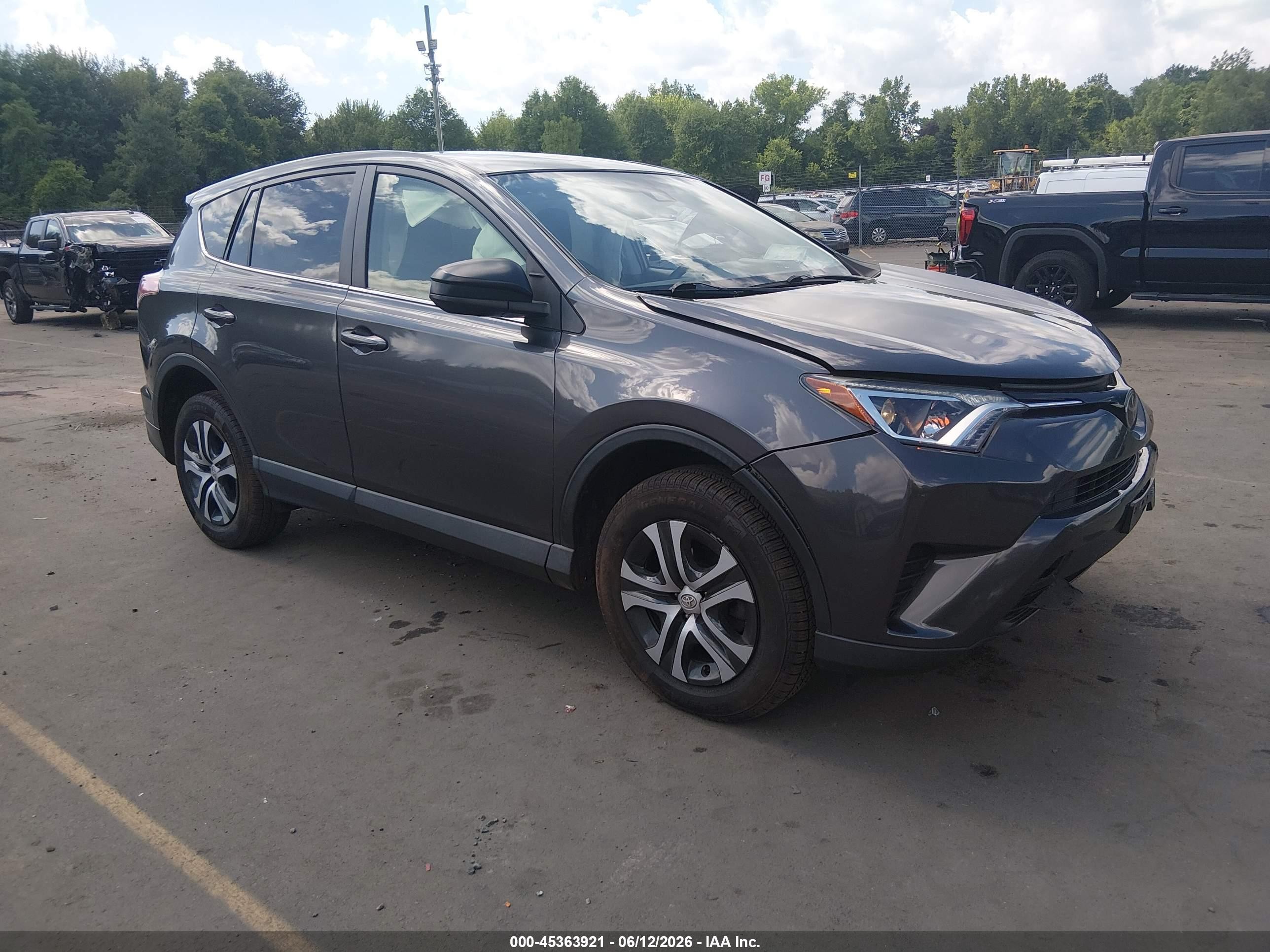 2018 Toyota RAV4 LE, VIN JTMBFREV6JJ244800 — Front end