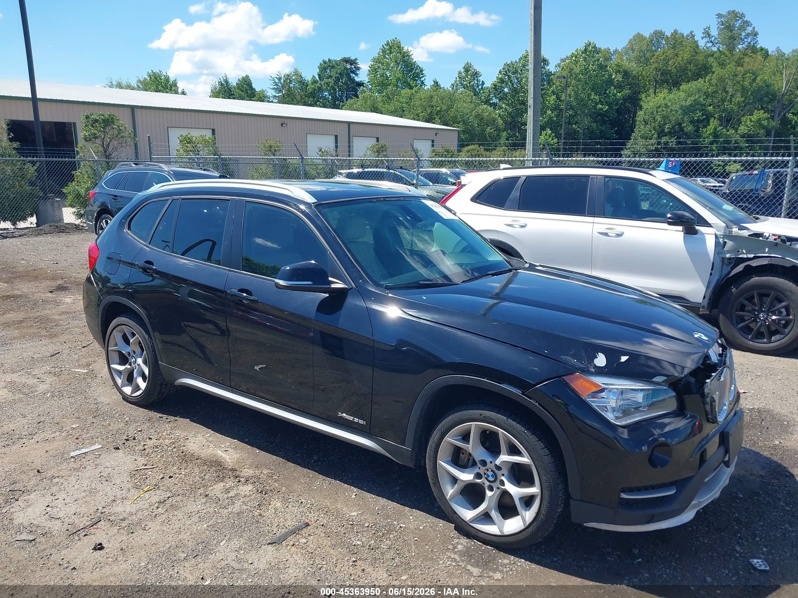 2015 BMW X1 xDrive35i, VIN WBAVM5C5XFVV95057 — Front end