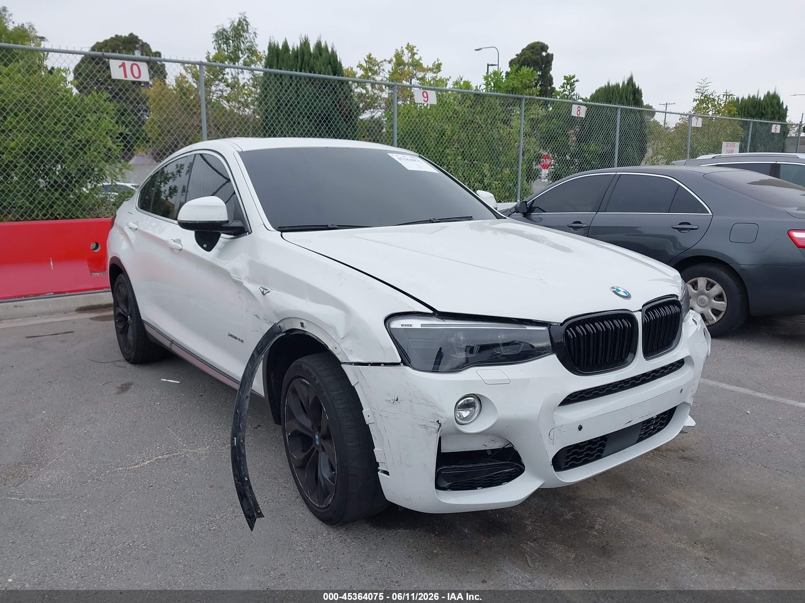 2015 BMW X4 xDrive28i, VIN 5UXXW3C53F0M86655 — Front end