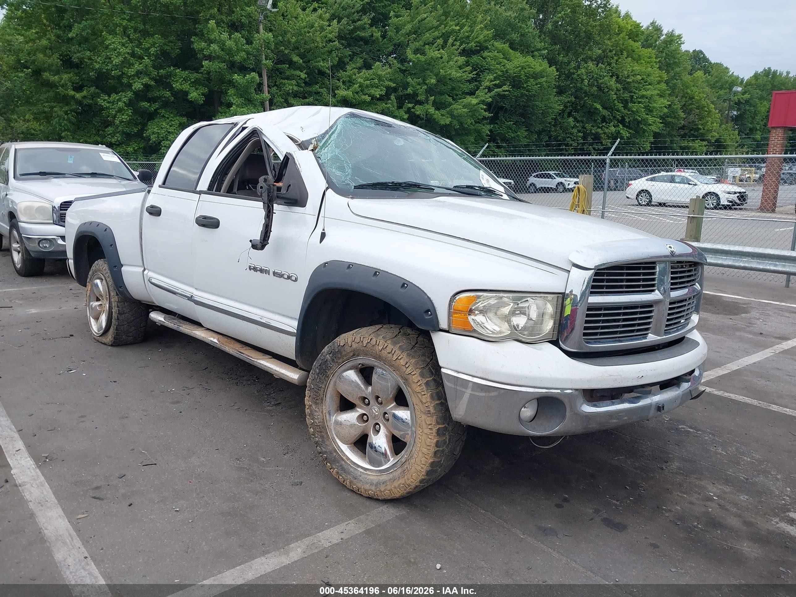 2004 Dodge 1500 SLT, VIN 1D7HU18D74S686140 — Rollover