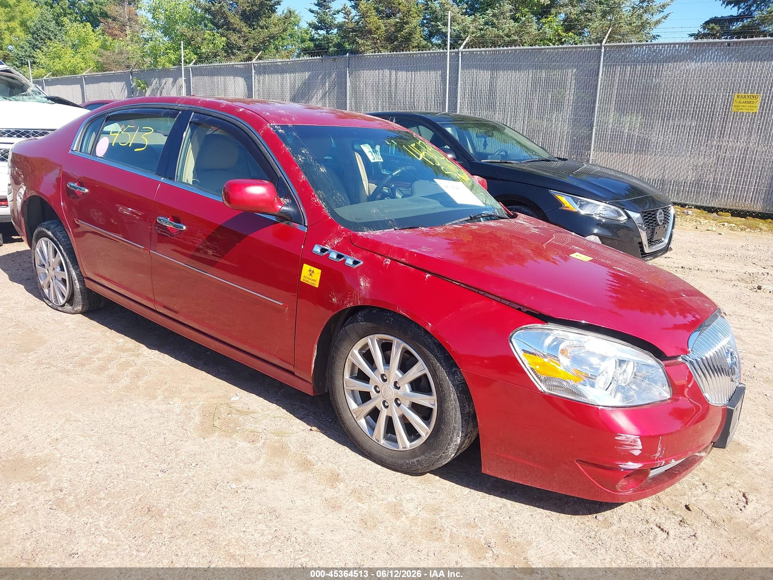 2011 Buick Lucerne CXL, VIN 1G4HC5EM7BU149323 — Side