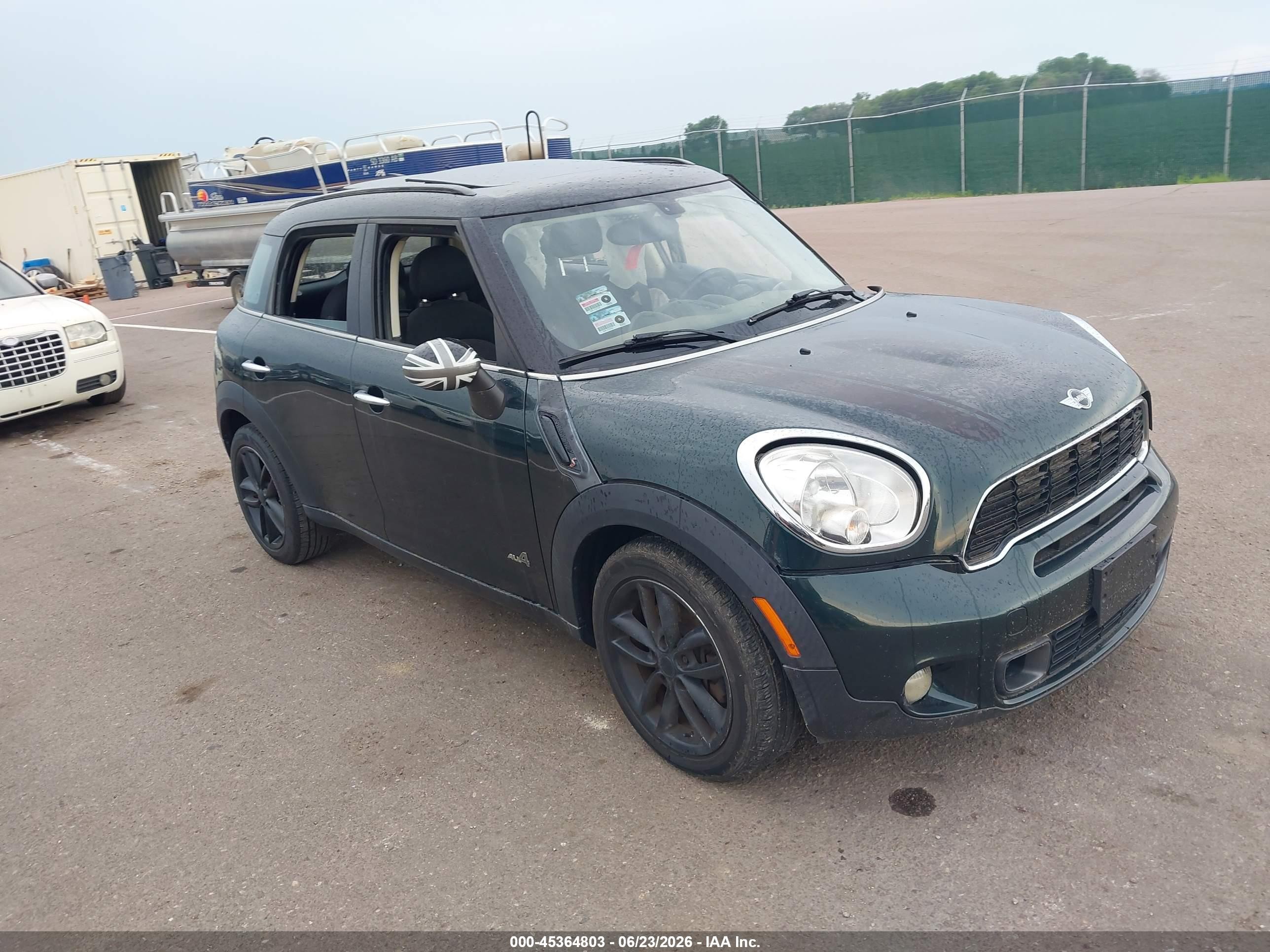 2011 MINI Countryman S, VIN WMWZC5C51BWL54013 — Side