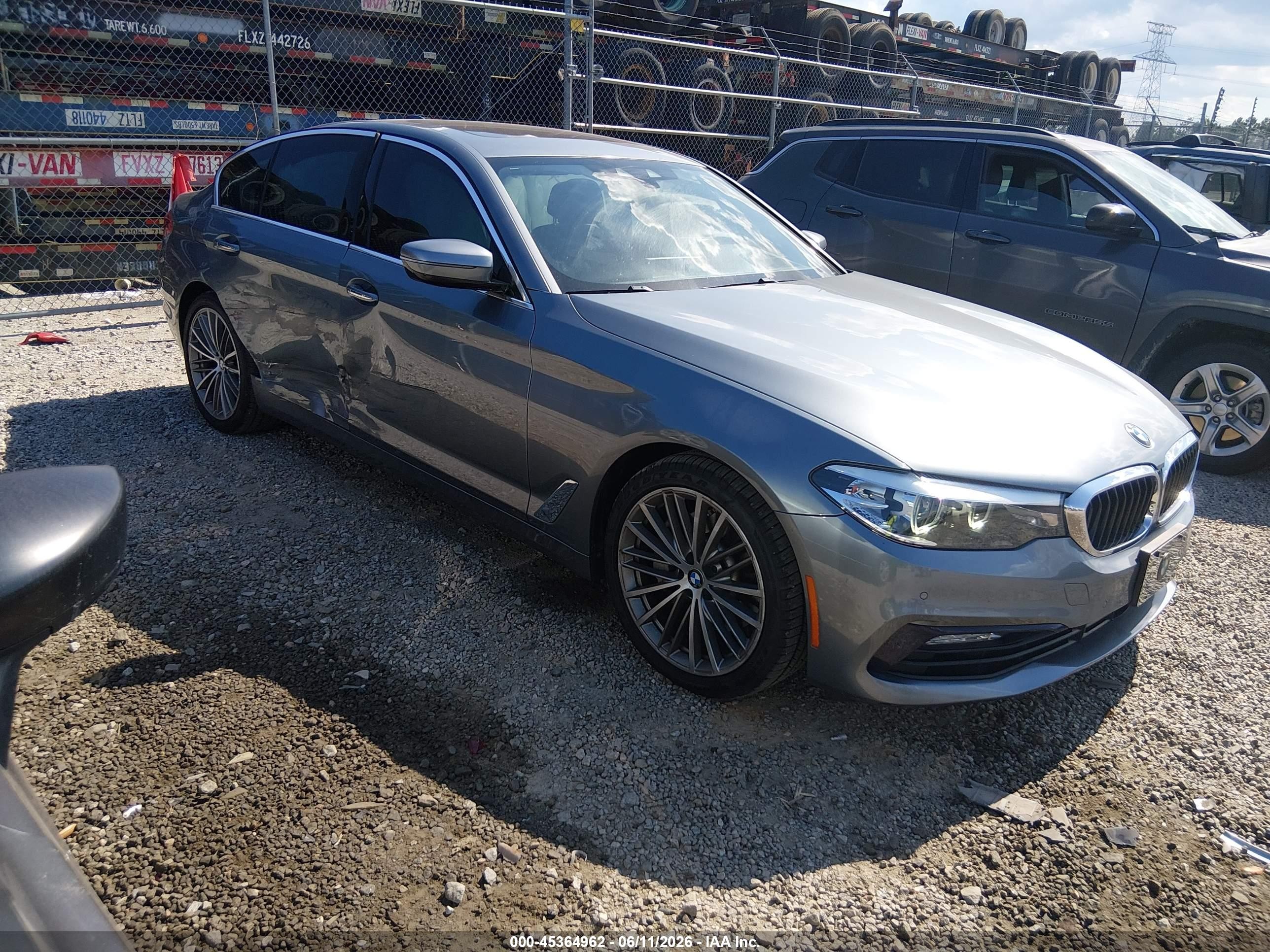 2018 BMW 5 Series 530i xDrive, VIN WBAJA7C5XJWC75388 — Side