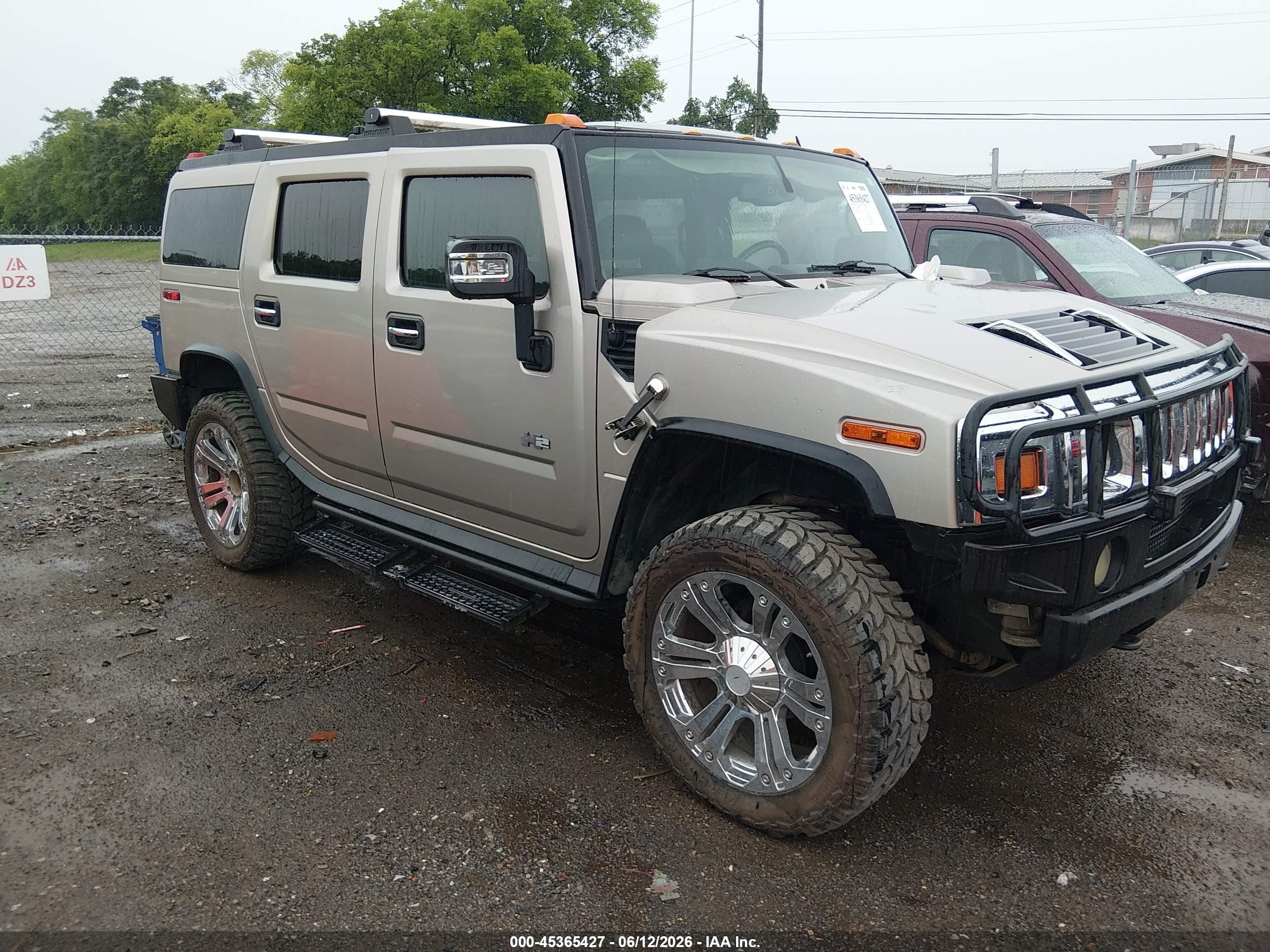 2006 Hummer H2, VIN 5GRGN23UX6H115420 — Side