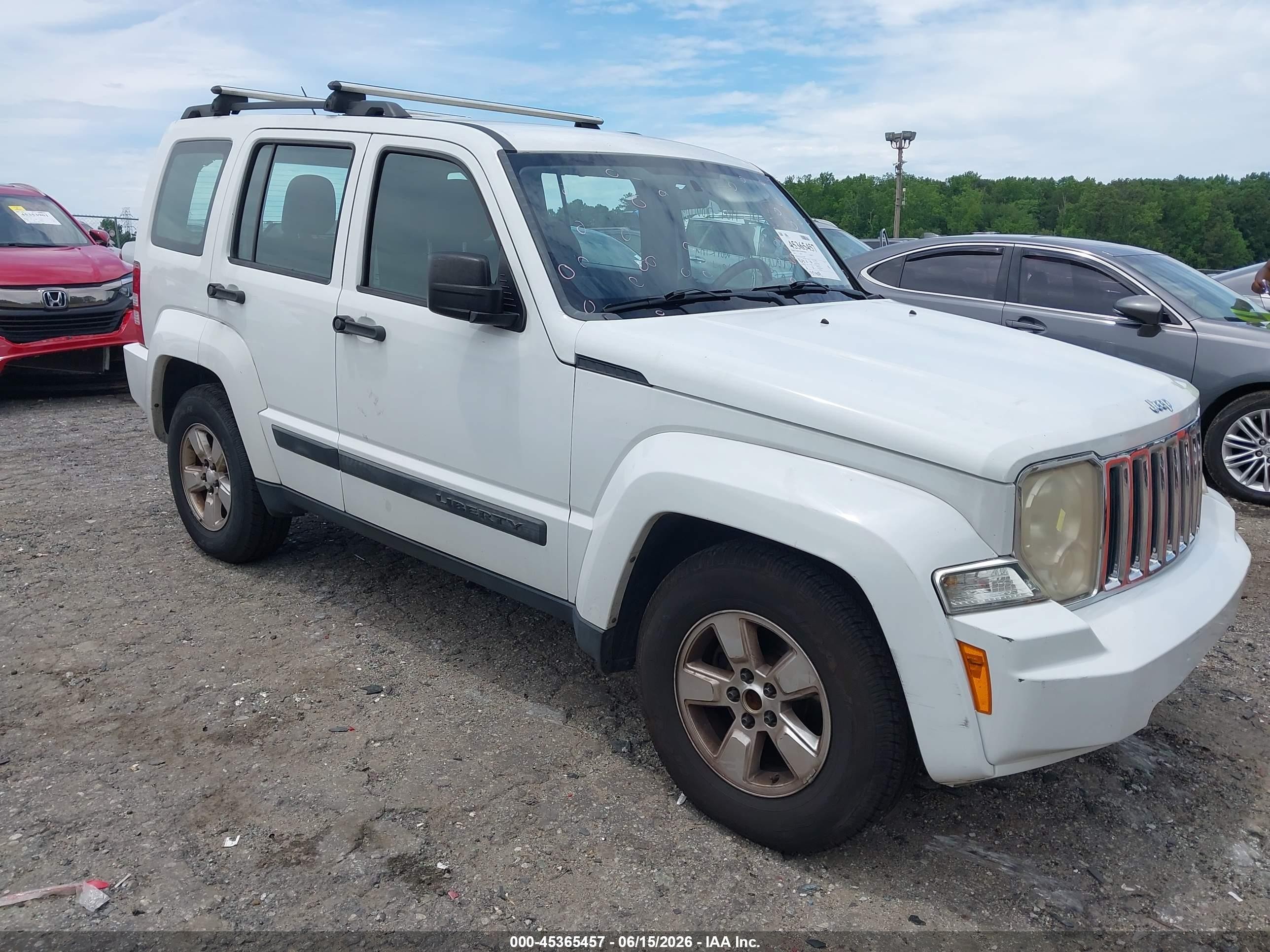 2012 Jeep Liberty Sport, VIN 1C4PJLAK2CW178846 — Бок