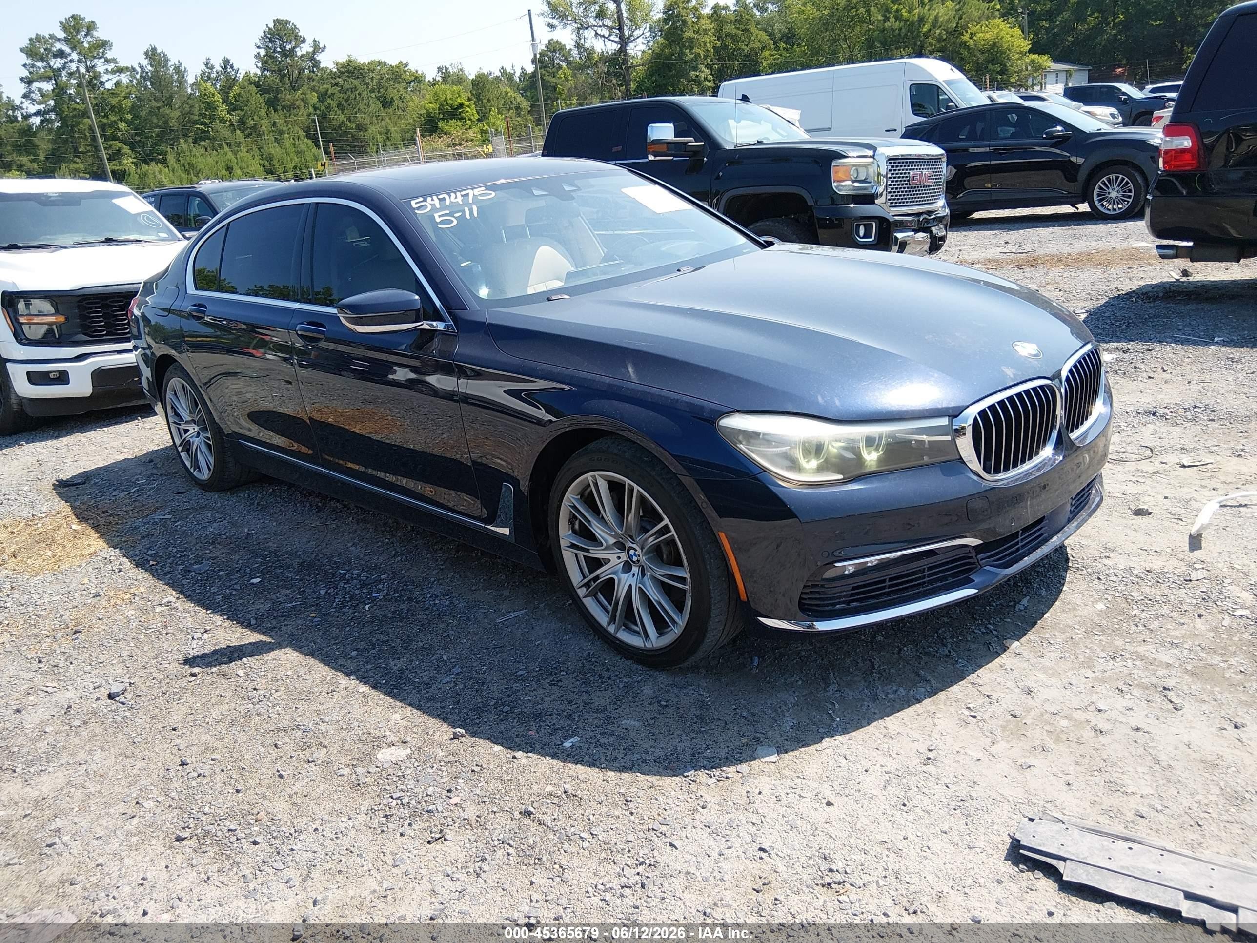 2016 BMW 7 Series 740i, VIN WBA7E2C55GG547475 — Side