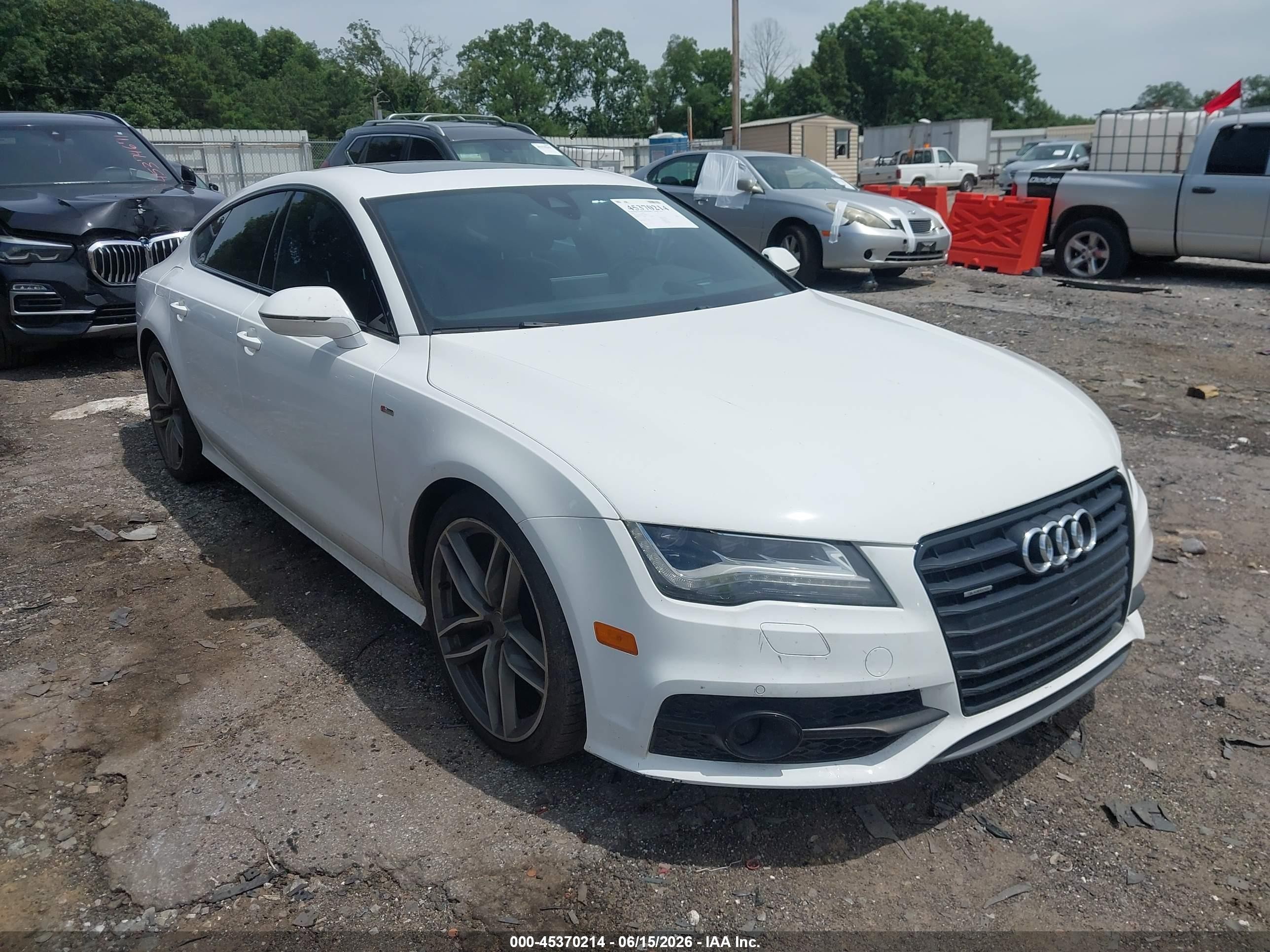 2015 Audi A7 Prestige, VIN WAU2MAFC8FN039352 — Rear end
