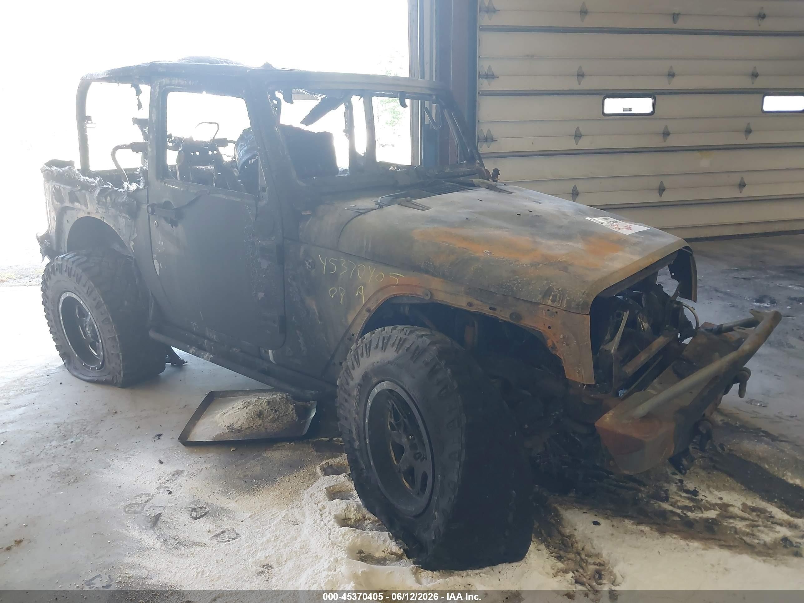 2009 Jeep Wrangler X, VIN 1J4FA24179L737210 — Burn