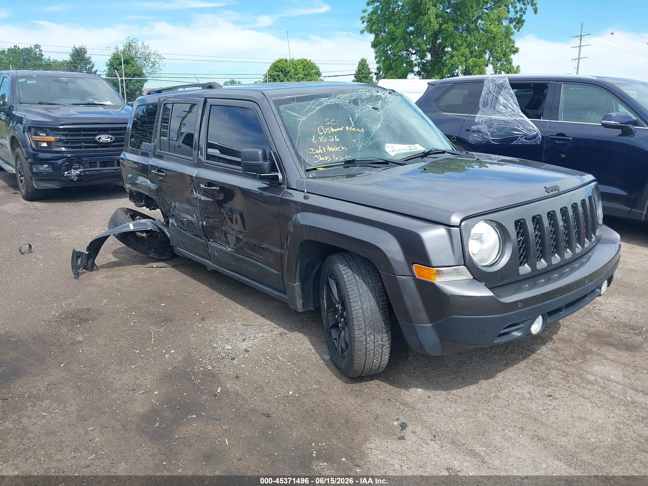 2015 Jeep Patriot Sport, VIN 1C4NJPBAXFD328240 — Rollover